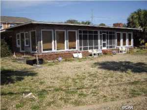 LOCATION! LOCATION! LOCATION! Very large lot located directly across the street from dedicated Santa Monica Beach. The property owners of Santa Monica Beach own approximately 1400 feet of gulf front property across the street from this property. You can sit in the family room/dining room and see the gulf. In addition you can see the gulf from the sun room, screen porch and office. No building are allowed to be constructed on the 1400 feet of gulf front property owned by the HOA. Age, SF, lot and room sizes are approximate. Please verify if important.