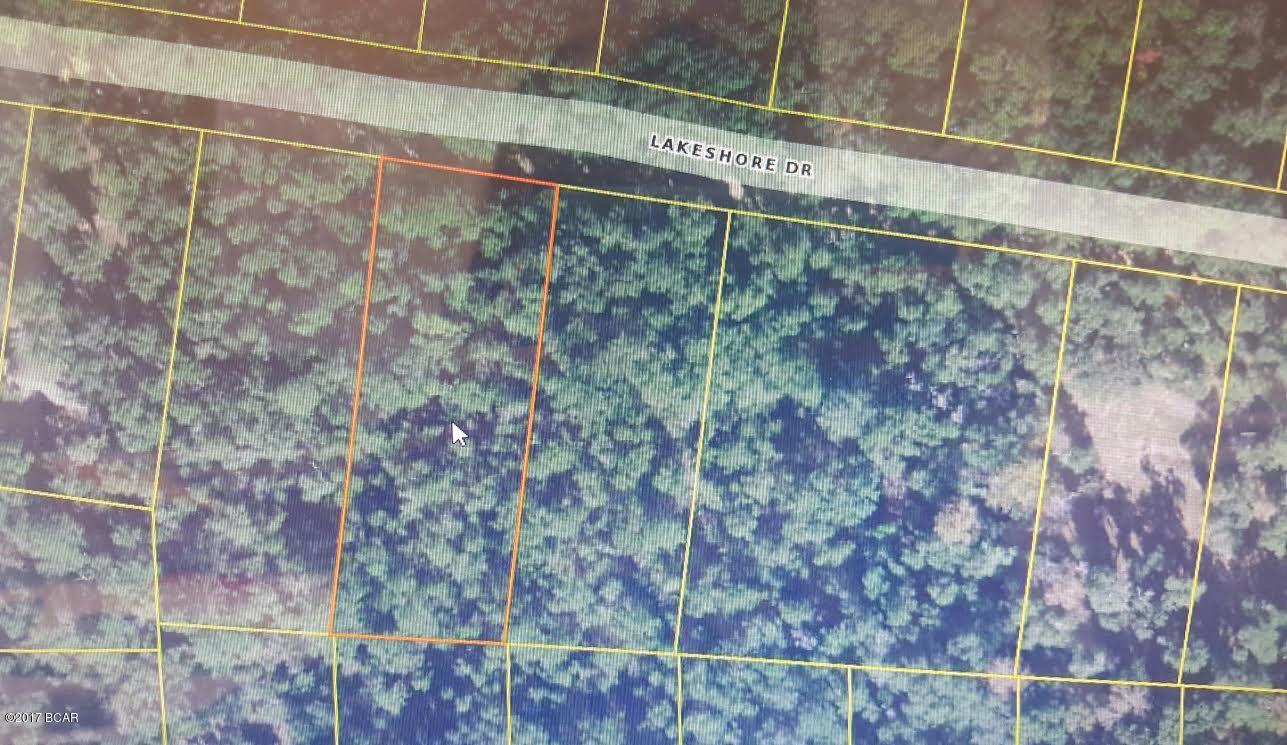 Nice wooded .63 acre located near Hicks Lake, Lucas Lake and other lakes with public boat landings. Mobiles ok. Would make a great homesite or weekend getaway. Approx 35 miles to Panama City Beaches, Pier Park shopping, NWFL Beaches Intl Airport and other amenities.
