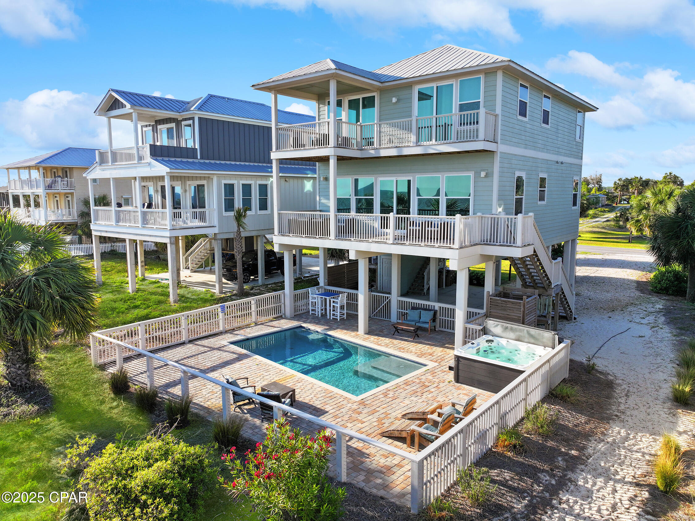 UNDER CONTRACT - ACCEPTING BACKUP OFFERS!  A stunning 4BR/4.5BA Gulf front beach home nestled in the beauty of Indian Pass. This exquisite property offers unparalleled views and a serene lifestyle on the tranquil shores of the Forgotten Coast. Step inside to discover a spacious main living area with an open-concept kitchen featuring granite countertops, modern appliances, a breakfast bar, and a pantry. The dining area seamlessly extends to a large deck, perfect for outdoor dining while soaking in the breathtaking Gulf views. This home boasts three expansive master suites and a charming bunk suite, each with private en-suites and spectacular vistas. Outside, enjoy the luxury of a private pool, an outdoor shower, and a private boardwalk leading directly to the pristine sandy beaches. Immerse yourself in the ''Old-World'' charm of Indian Pass, where adventure awaits just a short drive away. Launch your boat at the nearby Indian Pass boat ramp for a day of fishing in the lagoon, exploring the untouched beauty of St. Vincent Island, or enjoying a family outing on the Gulf. Experience the ultimate coastal lifestyle, where every day feels like a vacation. Don't miss your chance to own a piece of paradise on the Forgotten Coast!