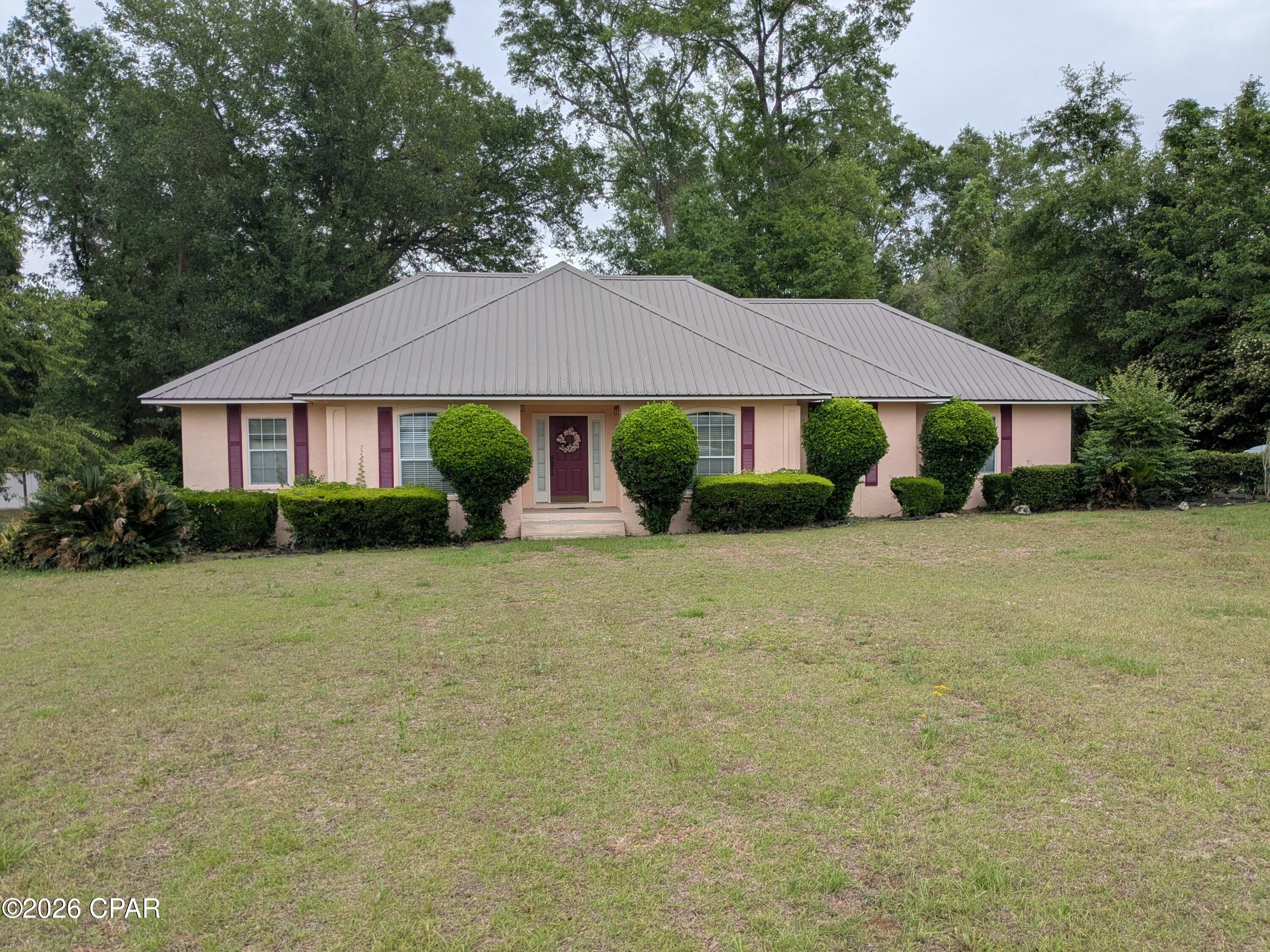 Very nice home located in Oaks Subdivision
North of Marianna off the Caverns Road.
Home has 3 spacious Bdrm's and 2 Baths.
Kitchen has new stainless steel appliances and home has new flooring throughout most of the house. The back deck is very large with lots of room for grilling out or relaxing under the trees overlooking the back yard. 
Home has annual renewable termite bond. Home has springler system in the very large front yard. Don't miss out on this one,