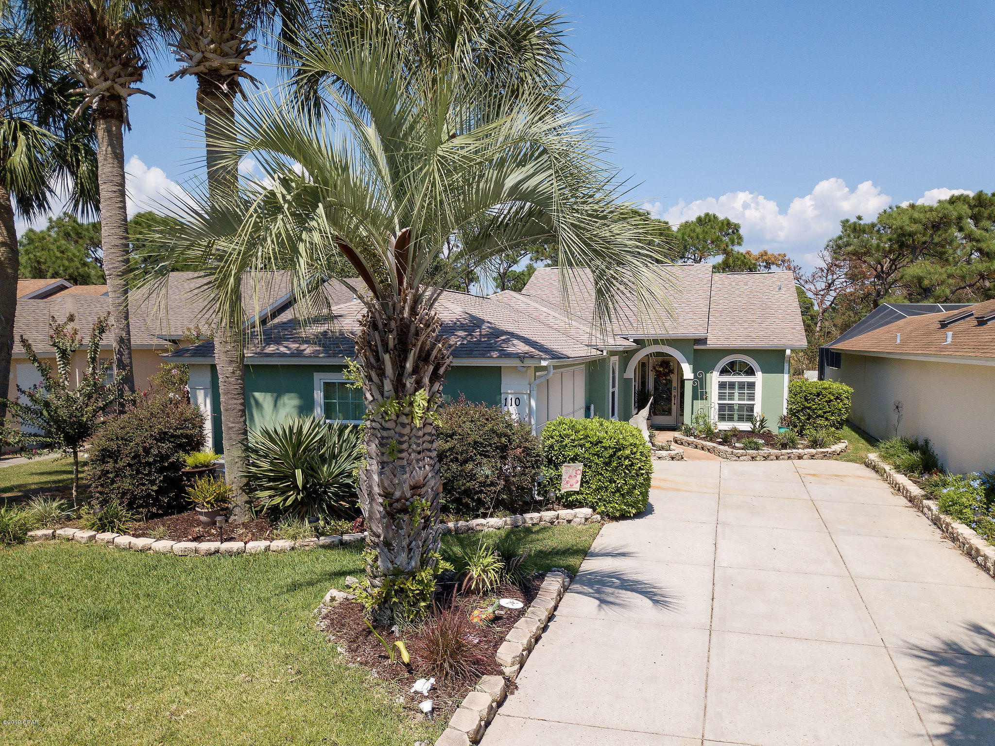 This house is easily the nicest ''patio home'' in The Glades with over 70k of upgrades! Beautifully landscaped, this 3 bed, 2 bath pool home is close to everything Panama City Beach has to offer.  



Upgrades to this home include solidly framed and correctly installed High Impact CGI windows throughout with a High Impact Tri-fold sliding glass door to the pool area, upgraded pool area and replaced pool pump, newly upgraded AC, open concept kitchen, both bathrooms totally upgraded and remodeled, solar panels for pool heating, as well as all plumbing has been completely replaced with PEX pipes to meet code and insurance requirements. The Glades is a well established and sought after community that is in close proximity to shopping, dining and of course The World's Most Beautiful Beaches! The main living area features vaulted ceilings and a beautiful open concept kitchen area not seen in other homes in this community and looks out onto the inviting screened in pool area. During the cooler evenings you can either relax by the pool or have some friends over for a cocktail in the screened in garage / man cave! Very low HOA fees in this neighborhood and the fact that it is so close to the beach makes The Glades one of the most popular neighborhoods in PCB! Call for a private showing today as this fantastic home will not last long!