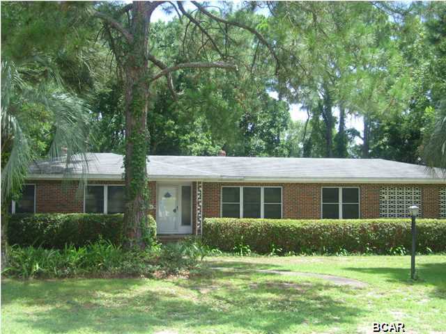 This is a lovely, well-maintained brick home in the St. Andrews area of Panama City. This home is a split level and features 4 Large Bedrooms,and 2 bathrooms. Spacious floor plan with formal living/dining area, separate den. Eat-in-kitchen comes equipped with steel appliances including range, side by side refrigerator, and new dishwasher. Plenty of cabinet space too. The home features some hardwood flooring, carpet, & tile flooring. Master bedroom has two clothing closets. Spacious 12x20 Balcony deck which overlooks the beautiful back yard. 2 car garage, separate laundry room, sprinkler system, security system. The home is convenient to shopping and schools. 5 minutes to the downtown Marina, 20 minutes to Tyndall AFB and

10 minutes to the beach & few blocks from the bay.