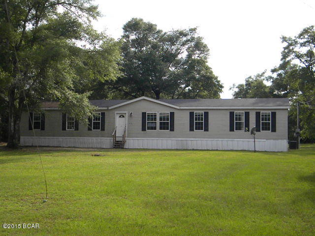 Want to be in the country then this is the home for you.  Large sq ft 4 bedroom mobile home on an acre just off of paved highway, large den with fireplace, master bedroom has an attached computer room or nursery, bathroom with shower and soaker tub along with a walk in closet.  The split bedroom plan is great for some needed privacy.  It may need a little work but will be a nice home.  Call to see today.