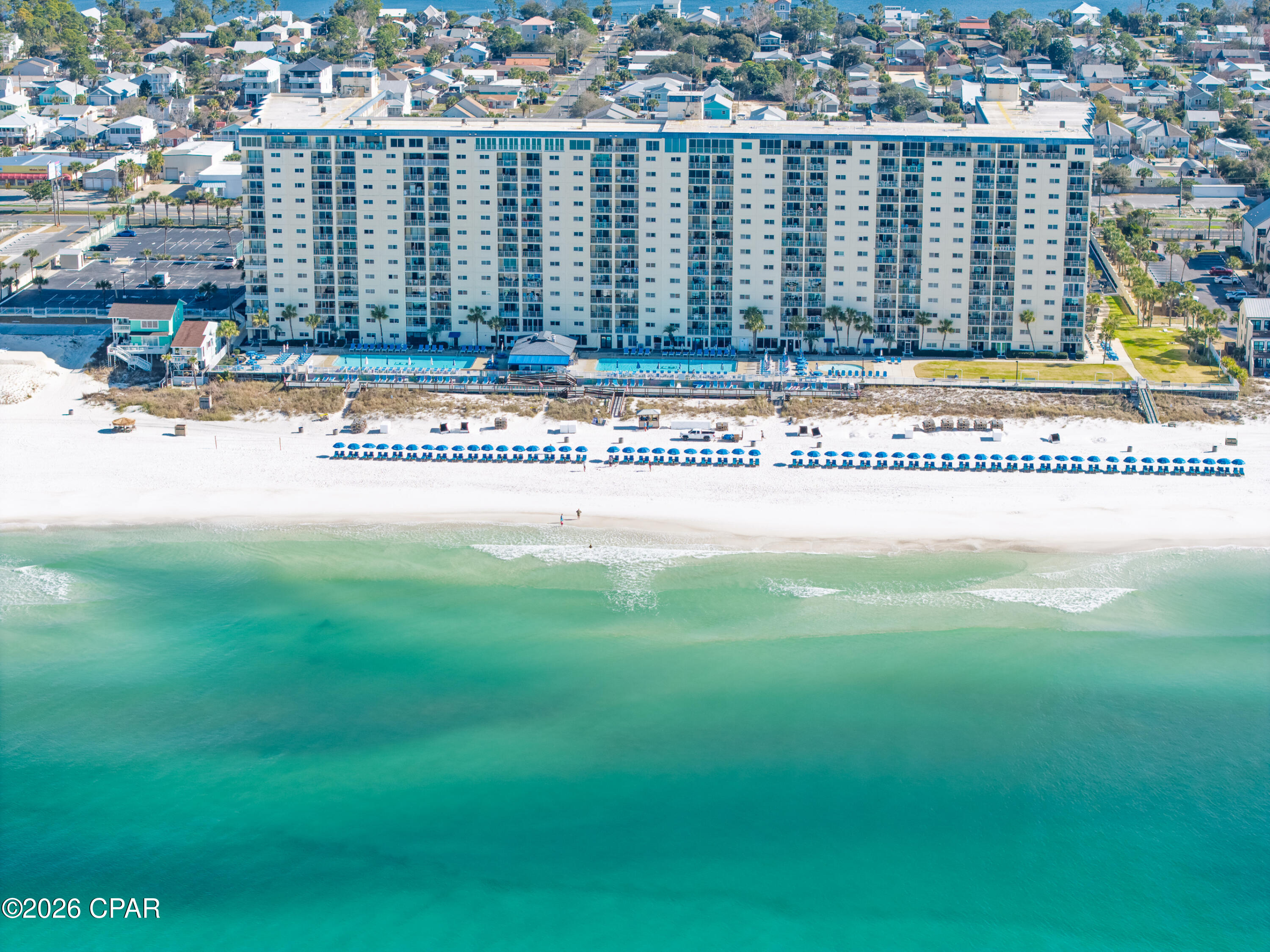 Skip the elevators and step straight into beach life with this 3rd floor end-unit at Regency Towers in Panama City Beach. Located on the desirable west side of the building next to the stairs, this 1-bedroom, 2-bath condo features a corner balcony with a sweeping coastline, plus direct Gulf, pool, and beach views. The additional west-facing living room window fills the space with natural light and showcases stunning sunset vistas. The condo has been updated with luxury vinyl plank flooring throughout, new bathroom vanities with granite countertops, shiplap accent wall, and a convenient stackable washer and dryer. The primary bedroom offers Gulf views and private balcony access through sliding glass doors. For over 40 years, Regency Towers has been a very popular beachfront destination,

offering gated access with 24-hour security, two beachfront pools (seasonally heated), kids pool, indoor hot tub, fitness center, game room, owner's lounge, picnic and grill area, boardwalk beach access, large green space, and poolside dining at Bikini Bob's.

Ideally located in the South Lagoon area near St. Andrews State Park, Cobra Adventure Park, and local favorites like Schooners and Fin's Island Style Grub, with the exciting new Hadley's Beach luxury development next door.

This condo has primarily been enjoyed by friends and family rather than used as a short-term rental, offering a well-cared-for coastal retreat.