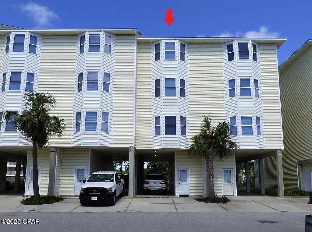 GULF VIEW, EXCLUSIVE, INVESTMENT PROPERTY.... Welcome to your dream beachside GULF VIEW retreat nestled in the exclusive gated community of Seacliffs on the sought-after North Cape San Blas! This stunning townhome spans four floors of luxurious living space with elevator servicing all floors.  The top floor invites you to a spacious living area, a modern and updated kitchen, and dining room, all comfortably decorated to host cherished family gatherings. On the second and third floors, you'll find two bedrooms each with private bathrooms, ensuring everyone enjoys their own space and comfort. The two master bedrooms are a highlight, featuring private decks with breathtaking Gulf views - the perfect setting for sipping morning coffee or watching the sun set over the horizon. This home includes a private elevator that services each level, providing both convenience and accessibility. Enjoy serene Gulf views from any of the three expansive decks and enjoy the community pool, playground and green space, ideal for relaxation and entertainment. Don't miss this incredible opportunity to own a family vacation home at Cape San Blas. Experience the best of coastal living in this beautiful beachside townhome.