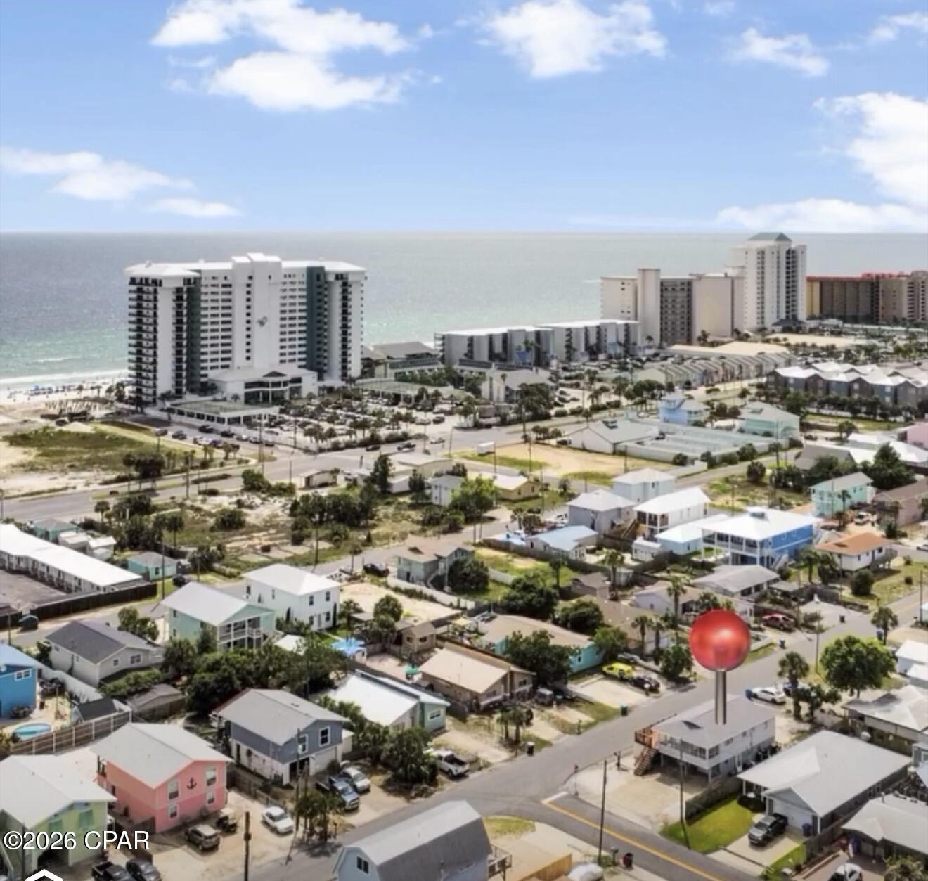 Opportunity is knocking just two blocks from the Gulf! Whether you're looking for an affordable beach getaway, an investment property, or a home you can make your own, this unique property offers endless possibilities because its sits on two lots on the corner.

Previously owner-occupied and most recently used as a long-term rental, this home is located in a short-term rental friendly area, giving you flexibility to enjoy it personally, generate rental income, or both. The main living area features 2 bedrooms and 1 bathroom upstairs, while the lower level offers an additional 1-bedroom, 1-bathroom living space that could potentially be utilized separately for guests, extended family, or additional rental opportunities.

Sitting on a generously sized lot with exceptional parking, there's room for multiple vehicles, boats, trailers, golf carts, and all your beach toys. The front yard easily accommodates several vehicles, while the rear parking area includes a dedicated Bahama rock pad designed for boat and trailer storage. Even better, you're just two blocks from public beach access and only two blocks from the Dolphin Boat Ramp, making it easy to enjoy both the Gulf and the Lagoon lifestyle.

With good bones, a large deck, a spacious sunroom, and a location that screams summer fun, this property is ready for its next chapter. Move in and enjoy it as-is, continue using it as an income-producing property, or update it to maximize its full potential. Beach properties with this much flexibility, parking, and location don't come along often at an affordable price point.
HVAC 2024
Water heater 2025
New Roof and Vinyl 2019