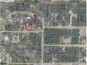Great Youngstown lot that is high and dry yet a stone throw from the water. Build your dream home on this mobile home friendly large lot. Quiet area. There is a well, septic, and power pole already on the parcel, but no guarantee is given as to the condition or usability. Can't beat this price!