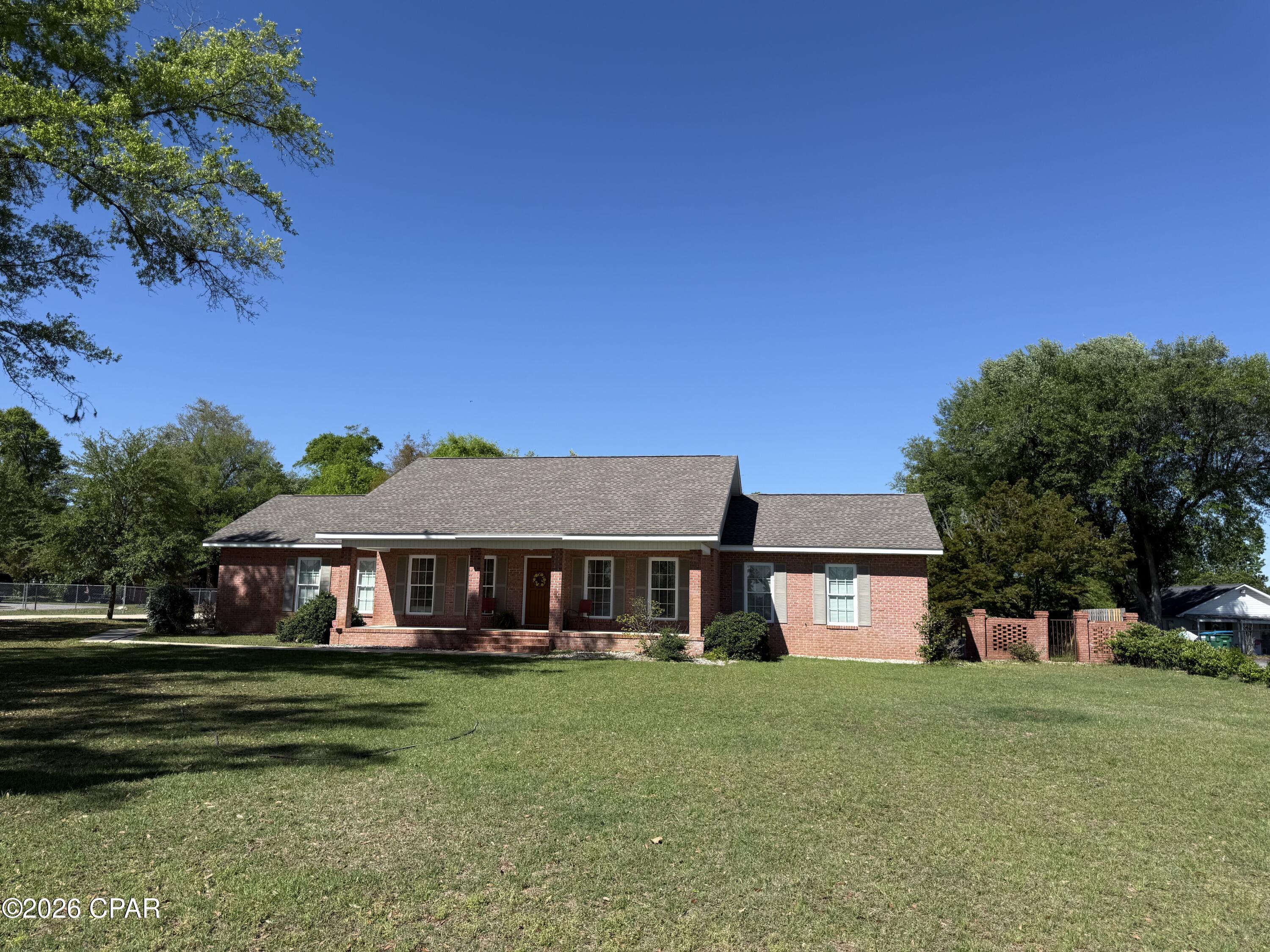 Welcome to this beautifully maintained 3-bedroom, 2.5-bath brick home nestled in an established neighborhood in Marianna. Immaculately clean and move-in ready, this home offers both comfort and functionality with thoughtful spaces throughout.

Step inside to a spacious great room that seamlessly combines the living and dining areas--perfect for both everyday living and entertaining. The kitchen is ideally situated between the dining room and a cozy breakfast area, creating an easy flow for gatherings and daily routines.

Enjoy the view of the pool from the sun room while relaxing, reading, or watching television.  

There is also a 40 ft long pole barn idea for a RV situated in the back of the large lot. 

The generously sized primary suite is a true retreat, featuring double vanities, a tub, and a separate tiled shower. Both full bathrooms include attractive tiled showers, adding a touch of quality and style.

One of the many features of this home is the 13 x 16 attached room overlooking the backyard ( currently used as storage) but an ideal space for a pool room or turning it into a relaxing, entertaining, or another peaceful place to enjoy the pool view.

Step outside to your private oasis: a large, enclosed backyard with a sparkling swimming pool, perfect for enjoying Florida living at its finest.

With its pristine condition, desirable layout, and inviting outdoor space, this home is ready to welcome its next owner.