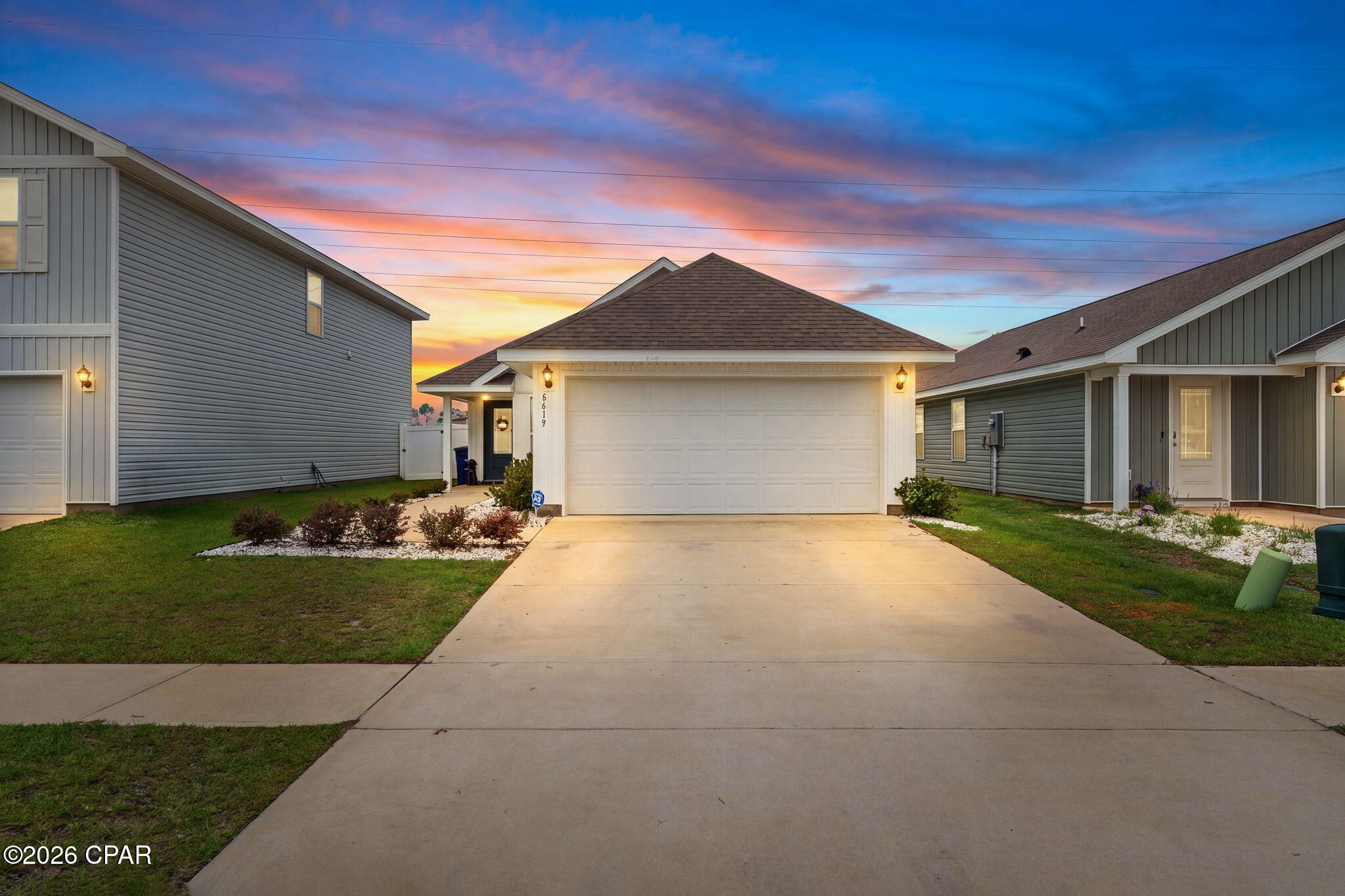 Step into the beautifully designed Celeste floorplan in Panama City, Florida, and immediately feel at home with its bright, welcoming entryway highlighted by an elegant prairie-style front door. This thoughtfully designed 3-bedroom, 2-bath home offers 1,439 square feet of comfortable living space with an open-concept layout perfect for both everyday living and entertaining.

The spacious primary suite serves as a private retreat, featuring two closets, a double vanity, a linen closet, and a convenient shower/tub combination. The kitchen is the heart of the home, showcasing stunning granite countertops and seamless flow into the main living and dining areas.

Enjoy outdoor living with a relaxing backyard patio and a beautiful 6ft white vinyl fence, creating the perfect space for gatherings, pets, or quiet evenings at home. The two generously sized secondary bedrooms are located on the opposite side of the home. They are separated by a full bathroom, offering the ideal split floor plan for added privacy and functionality. The garage is coated with a beautiful epoxy coating.

This home combines comfort, style, and practicality, a perfect opportunity for homeowners looking for modern living in a warm and inviting space.