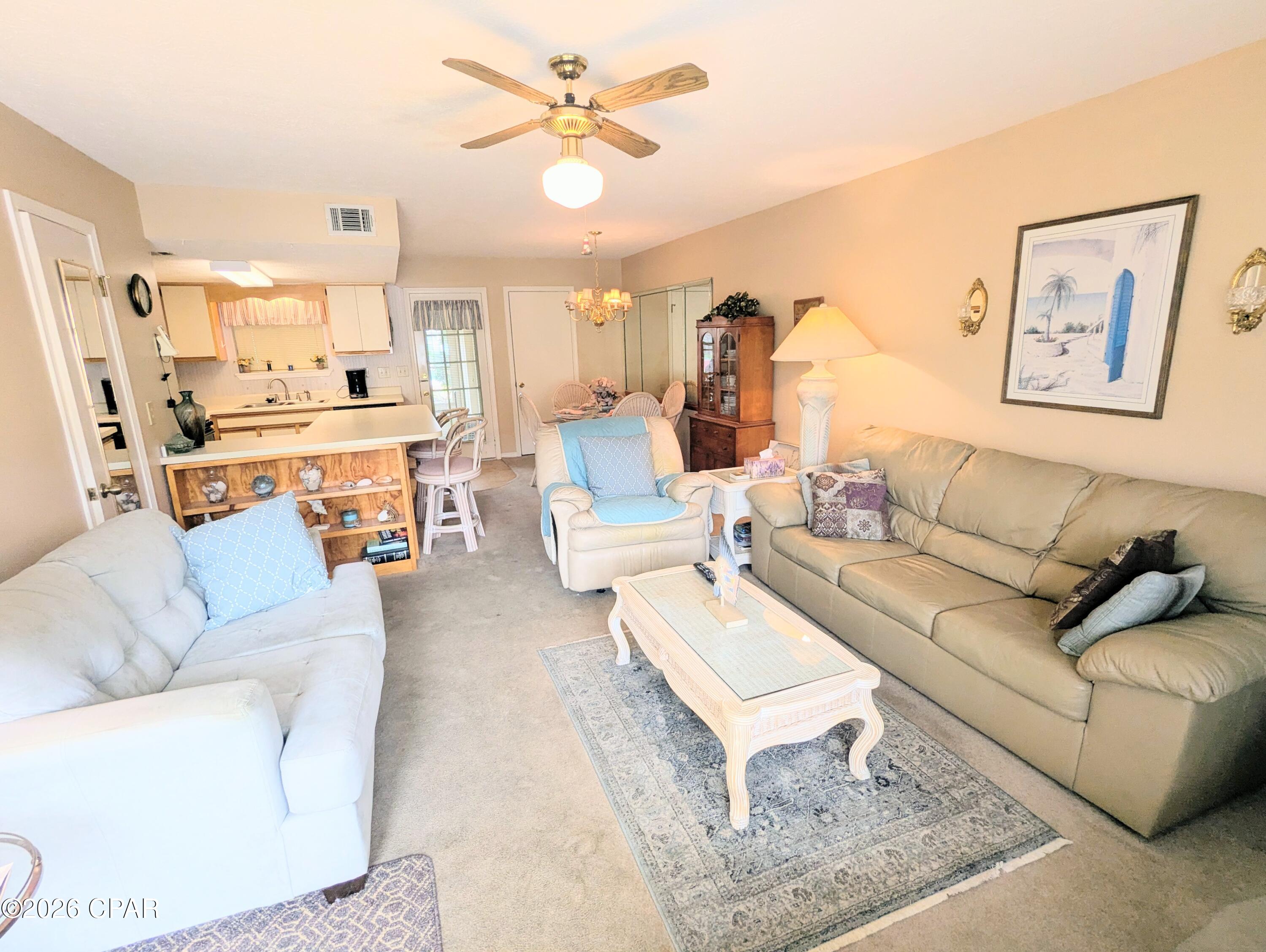Looking for your next project? This well cared for townhome is simply in need of a refresh. With 2 bedrooms and 2.5 bathrooms, this home has plenty of living space. Enclosed patios make it live even larger than the square footage shows. The master suite features a separate ''den'' seating area with great views. Ideal location backing up to the community pool. Also, a short stroll to the Gulf! Don't miss your chance to own a like-new beach home at an amazing value! LOW HOA includes: 11 pools (5 heated), shuffleboards, water-front restaurant & pool, mini golf, exercise room, tennis courts, pickleball, playground, WIFI, pest control, termite bond, trash, ground keeping, irrigation, property patrol, gated community, and more. Being sold as-is with the right to inspect.