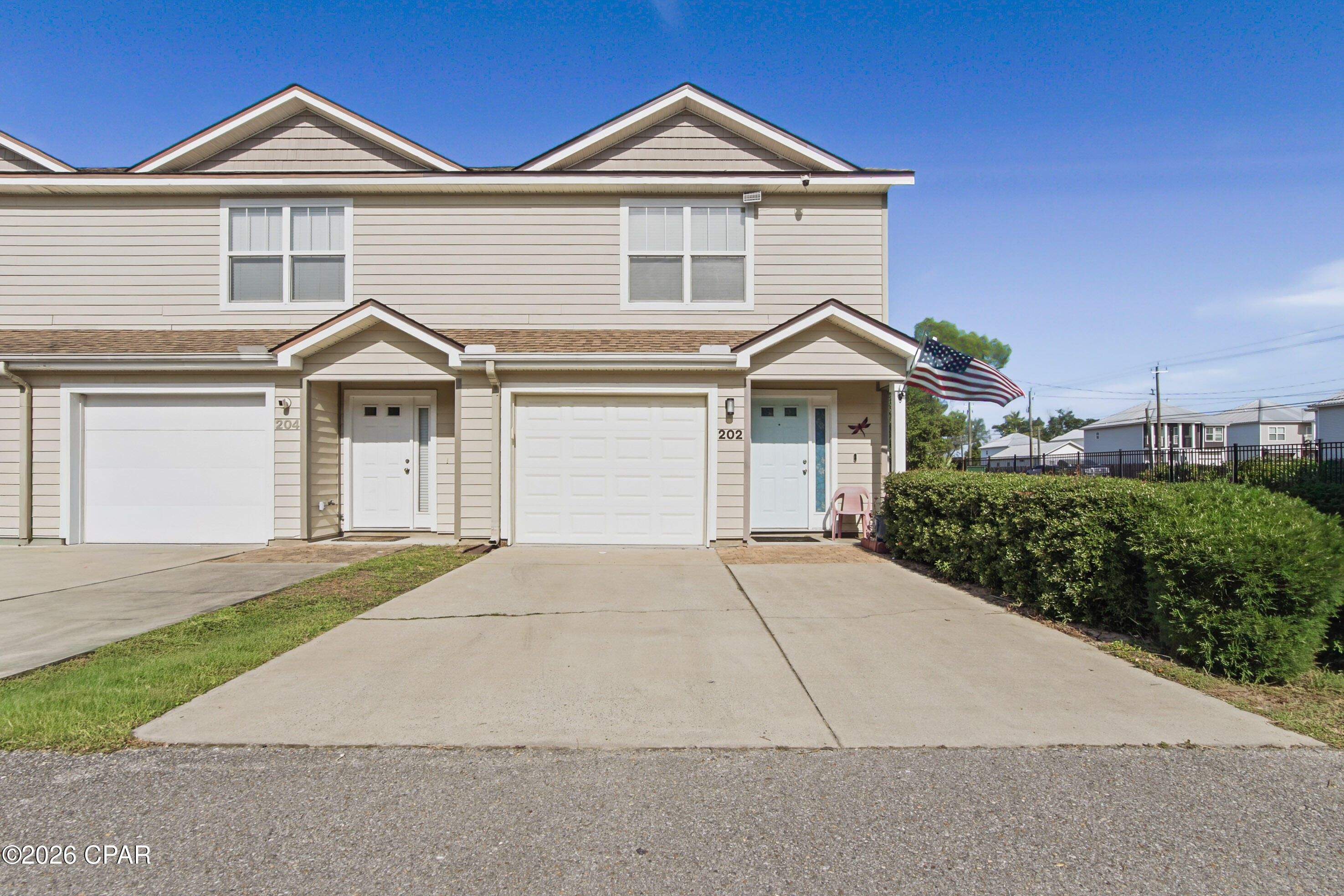 Immaculate end-unit townhome! This 3Br/2.5Ba home features fresh paint, open Kitchen/Living Room, new stainless steel appliances, a large side yard, oversized patio area, and Hardie board siding. Plenty of room in the one car garage for the family car. The Washer & Dryer are included, and all furnishings are negotiable. Located within walking distance of shopping and dining. Only 15 minutes from TAFB. Whether you're looking for a starter home, rental investment, or just down-sizing, this beautiful home will not disappoint!