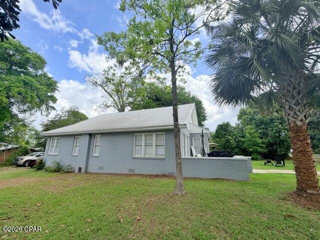Exceptional mixed-use commercial opportunity located in the heart of historic downtown Marianna, Florida. Positioned just blocks from the downtown business district, this beautifully refurbished brick property offers outstanding potential for business owners, investors, entrepreneurs, or live/work concepts seeking a prime location with excellent accessibility and visibility.  The property's location is one of its greatest assets. Situated only moments from downtown Marianna's restaurants, shops, government offices, community events, and local businesses, this property benefits from consistent traffic flow and the growing appeal of downtown redevelopment. Clients, customers, and guests will appreciate the convenience of being within walking distance to the heart of the city while enjoying the charm and character that historic downtown Marianna is known for.

Occupying a spacious 0.24 +/- acre corner lot, the property offers enhanced visibility, multiple access points, and excellent curb appeal with mature landscaping and an inviting exterior presence. The prominent corner positioning provides additional flexibility for signage, parking options, outdoor seating or gathering areas, and increased exposure for a future business operation.  Zoned Mixed-Use with Neighborhood Commercial possibilities, this property provides valuable flexibility for a wide range of commercial and investment opportunities. Whether you're expanding your business footprint, launching a new venture, or seeking a unique income-producing property in a desirable downtown corridor, this property offers exceptional potential in a highly sought-after location.

Currently configured as a 3-bedroom, 2-bath structure, the property blends historic character with modern updates