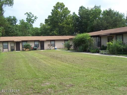 Single story apartment with washer & dryer hookups close to Tyndall AFB; pest control, garbage, and yard service included.