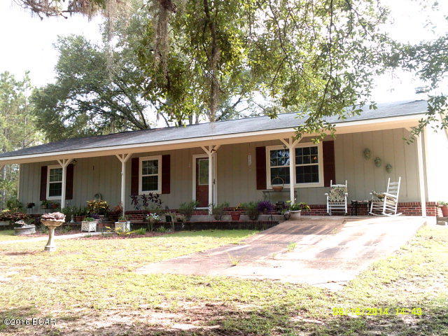 Well Maintained attractive 3 bedroom, 2 bath home across road from Lake Seminole, only .7 mi to boat landing. Split bedroom design with spacious master bedroom and two walk-in closets. Open living-dining-kitchen area makes entertaining enjoyable. Covered front porch and patio with Bar B-Q pit extends entertaining to the outside. Garage/workshop with attached boat shed has 220 elec, concrete floor and workbench. Yard is completely fenced, landscaped and has 2 fig, 1 young pear and 4 pecan tees. Ceramic topped bar in kitchen will be left, but wood top will be removed.