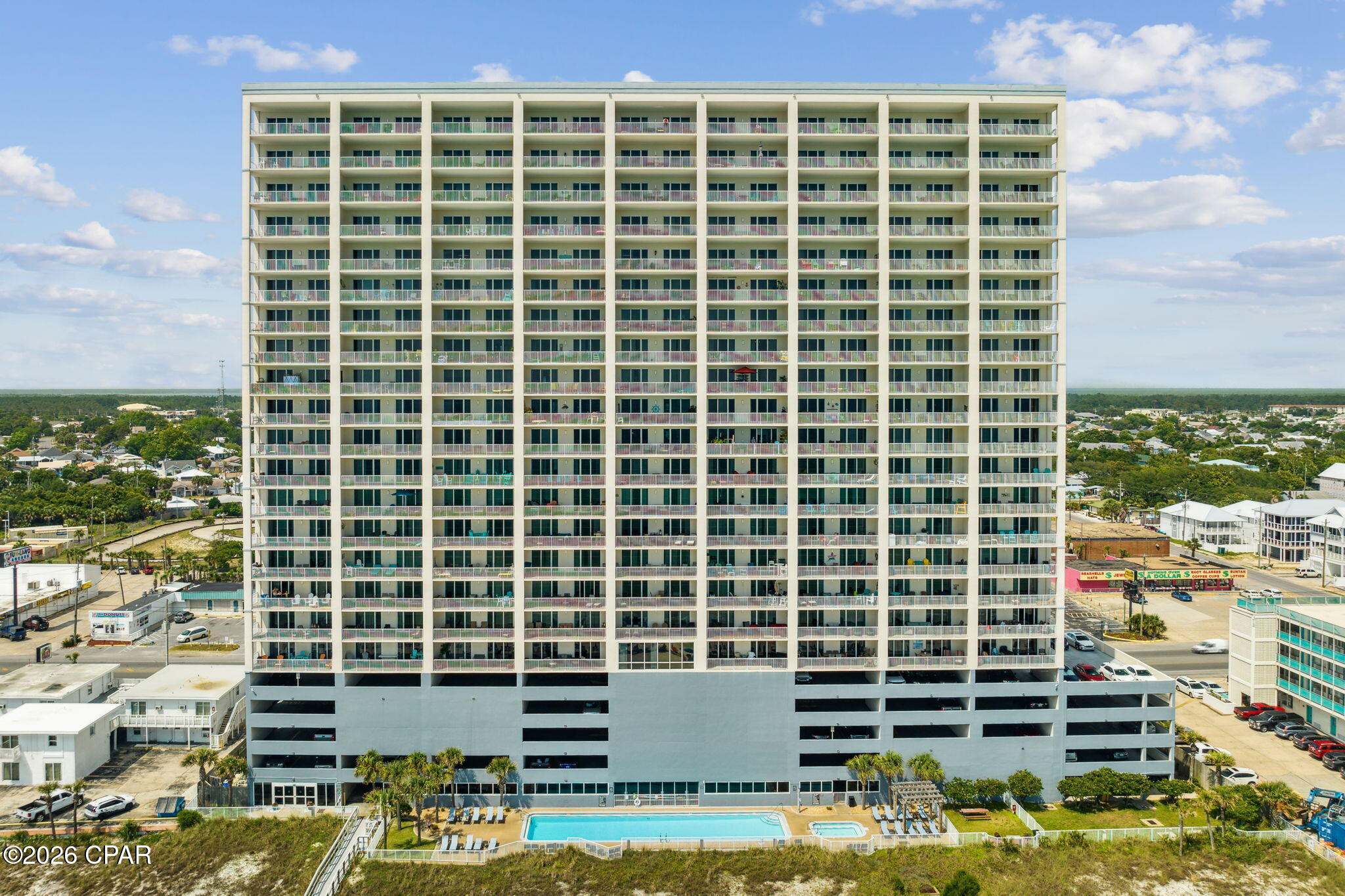 Ocean Reef 1308 - Gulf-Front Luxury in Panama City Beach.  Welcome to Ocean Reef 1308, a nicely  appointed 2-bedroom, 2-bath Gulf-front condominium offering breathtaking views of the emerald waters and sugar-white sands of Panama City Beach. Located in Ocean Reef Resort, this exceptional residence features a spacious 10' x 28' beach-front balcony perfect for sunbathing or enjoying meals and drinks while admiring the stunning sunsets and Gulf views.  Inside, you'll find an open-concept floor plan designed to maximize both comfort and scenery. Luxury vinyl plank flooring flows throughout the main living areas, while expansive sliding glass doors showcase spectacular Gulf views from the entryway, kitchen, dining area, living room, and primary suite.  The well-appointed kitchen features stainless steel appliances, tiled backsplash, breakfast bar seating, and custom designer light fixture. The Gulf-front primary suite offers private balcony access, a king-size bed, and ensuite bath with double vanity. A spacious guest bedroom easily accommodates two queen beds, making it ideal for family and guests. The guest bath provides private access to the guest bedroom and  accessibility to the main living area. Both bathrooms feature combination shower/tubs and are upgraded with stylish vanity countertops, mirrors, and fixtures. A separate laundry room includes washer, dryer, additional storage cabinetry, and wall hooks for beach gear and accessories.  Offered fully furnished and rental-ready, this turnkey property is an excellent opportunity for a vacation home, investment property, or full-time beachfront residence. You'll love the exclusive, assigned, parking space making parking a breeze.  Ocean Reef owners and guests enjoy outstanding resort amenities, including a Gulf-front outdoor pool and hot tub, indoor heated pool, steam room, sauna, fitness center, and outdoor grilling area.  Conveniently located near some of Panama City Beach's most popular attractions, you'll find Hidden Lagoon Mini Golf & Racetrack, Alvin's Island, and a local coffee and donut shop just across the street. Beachfront dining and cocktails await next door at Runaway Island.  Pier Park, located just 1.5 miles away, features premier shopping, dining, and entertainment including: The Grand 16 Theater, Topgolf, PCB SkyWheel, and new Pirates Voyage Dinner Show. Whether you're searching for an investment property or your own piece of paradise, Ocean Reef 1308 deserves a place at the top of your must-see list.  Buyer to verify all square footages and  room dimensions if important.