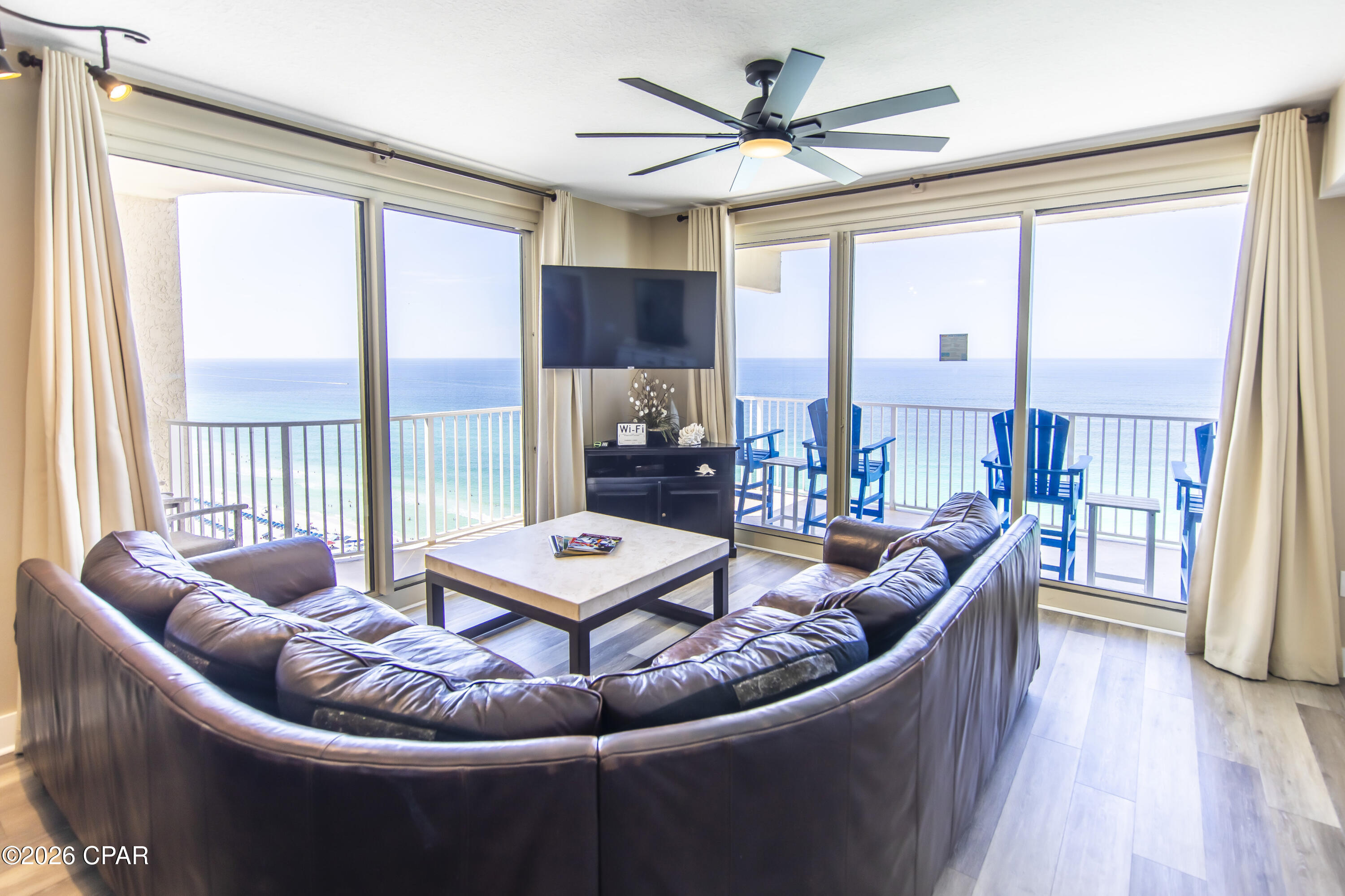 Welcome to an extraordinary Gulf-front escape soaring above the sugar-white sands of Panama City Beach from the 19th floor of the renowned Shores of Panama Resort. Offering spectacular panoramic views of the emerald-green waters of the Gulf of Mexico, endless coastline, and the resort's stunning lagoon-style pool, this exceptional residence captures the very essence of luxury coastal living.

Beautifully appointed and offered fully furnished, this turnkey 2-bedroom, 3-bath condominium is ready to be enjoyed from day one. Floor-to-ceiling views create a breathtaking backdrop throughout the main living areas, while the expansive private balcony provides the perfect setting to enjoy morning coffee above the shoreline, watch dolphins play in the surf, or unwind as the sun melts into the horizon.

Recently renovated bathrooms add a fresh and sophisticated touch, while the thoughtfully designed floor plan offers both comfort and functionality. In addition to the spacious bedrooms, the residence includes a versatile bunk alcove conveniently located adjacent to the half bath, providing additional flexibility for hosting family and guests.

Every detail needed for immediate enjoyment is already in place, with furniture, appliances, décor, and household contents conveying with the sale. Whether seeking a personal beachfront sanctuary, a luxury vacation retreat, or a rental-ready investment opportunity, this residence is positioned to deliver an exceptional ownership experience.

Included with the property is reserved covered parkin space 8th floor, 1903, within the resort's private parking garage, providing convenience and peace of mind.

Shores of Panama remains one of Panama City Beach's most sought-after beachfront destinations, celebrated for its direct beach access, breathtaking tropical lagoon-style pool, indoor pool, hot tubs, fitness center, and impressive resort-style amenities. Ongoing community improvements and enhancements continue to elevate the property's appeal and long-term value.

Rarely does an opportunity arise to own a residence that combines such captivating Gulf views, resort luxury, turnkey convenience, and an unbeatable beachfront location. From the moment you step inside, you'll understand why Shores of Panama continues to be one of the most desirable addresses on the Emerald Coast.

Buyer to verify all measurements, dimensions, square footage, and any information deemed important.