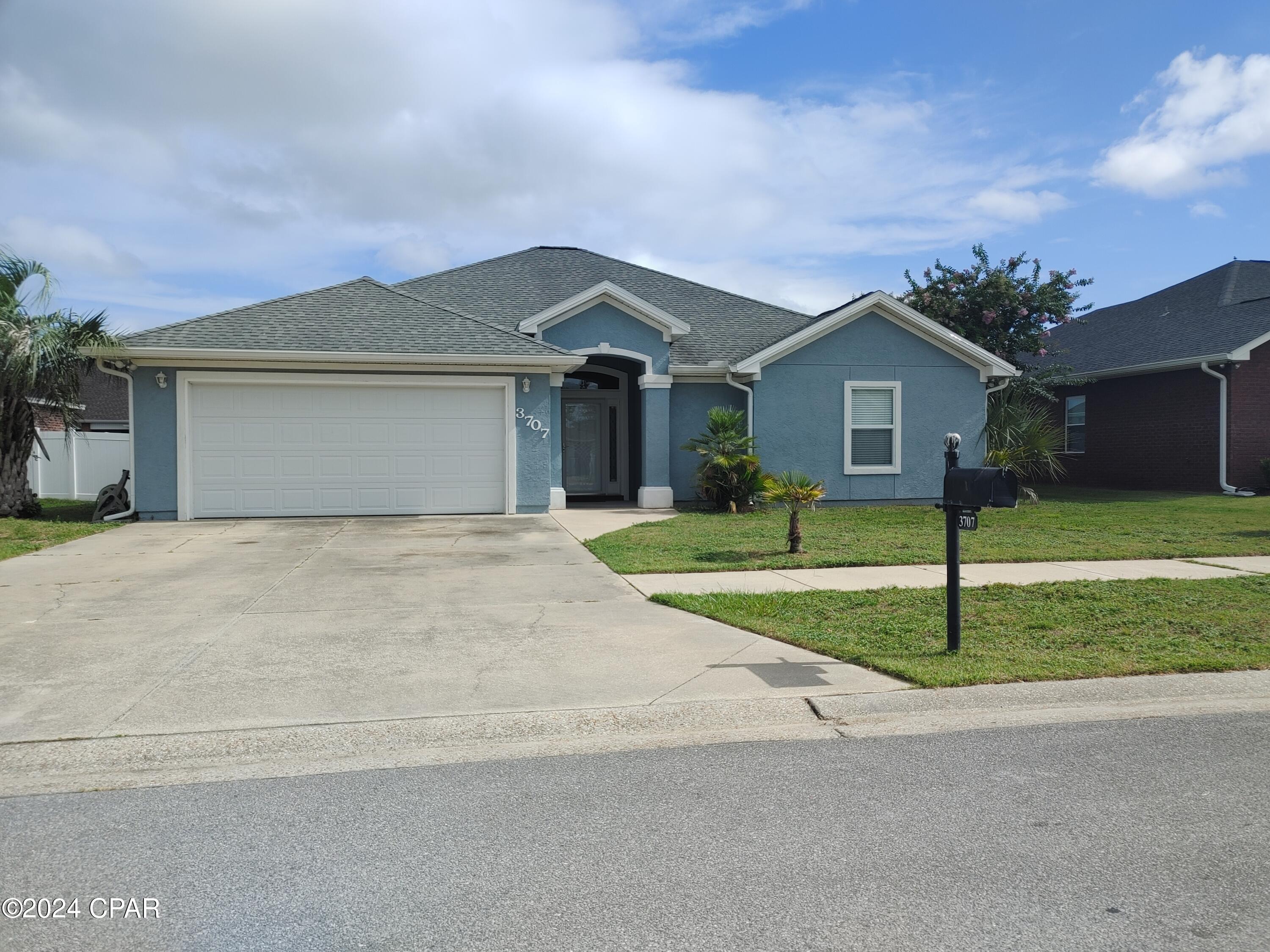 This spacious home is located in the wonderful subdivision of The Hammocks, centrally located to shopping and dining and this subdivision has just recently renovated the community pool. The home features vaulted ceilings, an open floor plan concept, tray ceiling in the master bedroom, huge soaking tub, brand new water heater and more. The converted garage created the 5th bedroom, yet still allows enough storage area to be practical. The 5th bedroom has a barn door on the closet entry and its own mini split heat and air system and would serve nicely as a 5th bedroom or easily convert to a mother-in-law suite since the water heater is accessible in that room. The fully fenced backyard boasts a beautiful vinyl white fence as well as covered patio area to enjoy a nice morning or evening relaxation time. Call for an appointment to view!