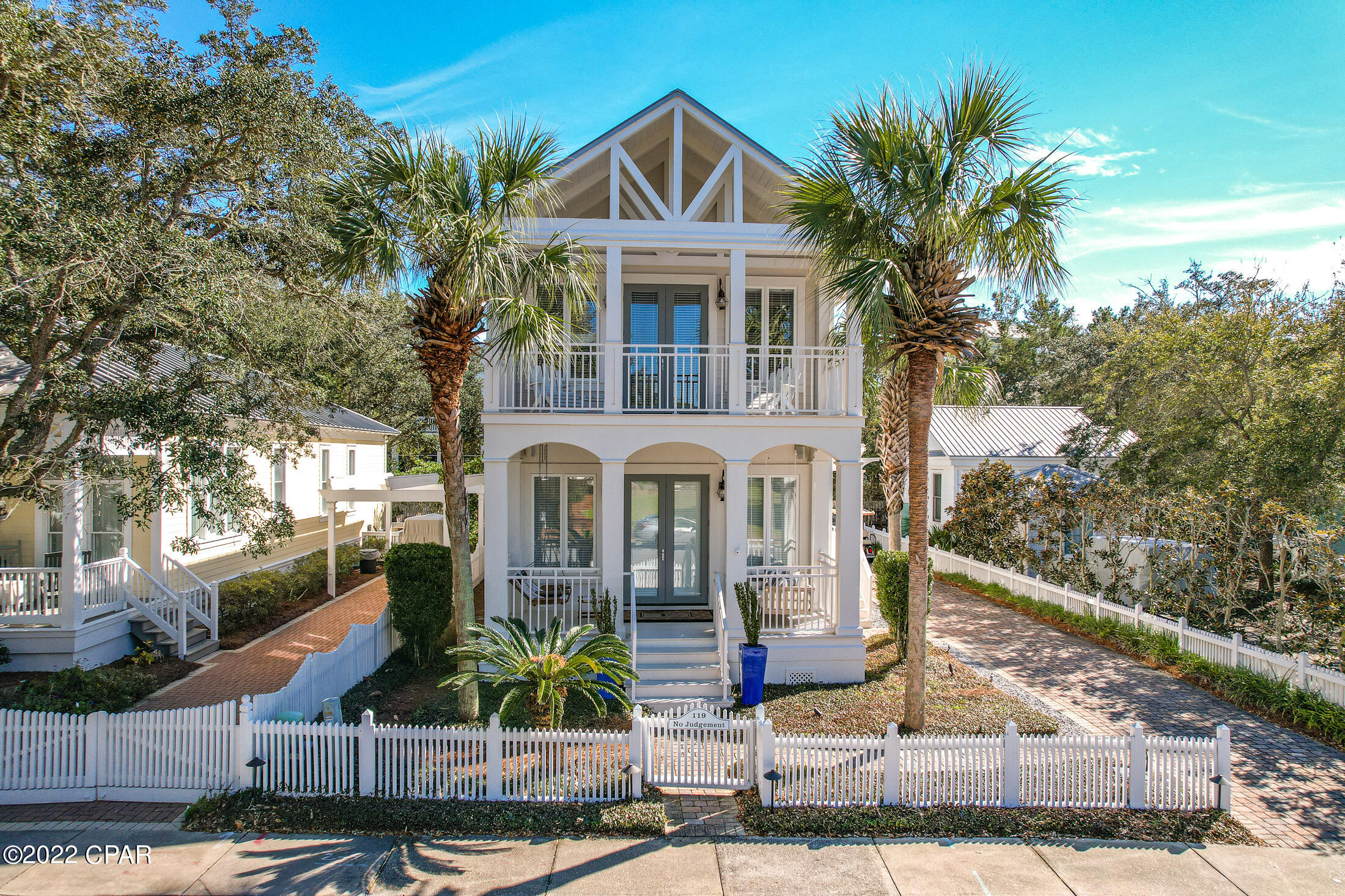 CURRENTLY UNDER CONTRACT, SELLER ACCEPTING BACKUP OFFERS This desirable gated community includes 3900'+ of sugar white sand beaches. The home would be a wonderful full time residence or an incredible rental property. The home features 3 Master Bedrooms and 3.5 Baths. Plenty of closet space. Owners lockout provided. Gorgeous Hardwood floors compliment the Beautiful Interior. 2 Brand New AC units. Tankless Water Heater 2021. Golf Cart Included! This lot has space for a guest or carriage house. The amazing location is across the street from Bellview Park, Westside Swimming & Kiddie Pool, Tennis Courts, Basketball Court Playground. Dining and shopping are offered in Carillon or just 2 minutes away to Scenic 30A and only 10 minutes  from Pier Park. BUYER TO VERIFY ALL IMPORTANT INFORMATION