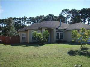 Stucco home is located in a quiet cul-de-sac neighborhood it is close to everything,the beach, shopping and entertainment. Home has a beautiful fireplace, tiled floors, open floorplan with kitchen open to a dining and living room. Large covered back patio and plenty of room in the yard. Home has visible termite damage in 1 room and stucco damage visible in the rear of home. Seller has completed Termite Treatment and Bond thru AtoZ Pest Control. Home is being sold ''as-is'' and all information and measurements are to the best of our ability and should be confirmed for accuracy.