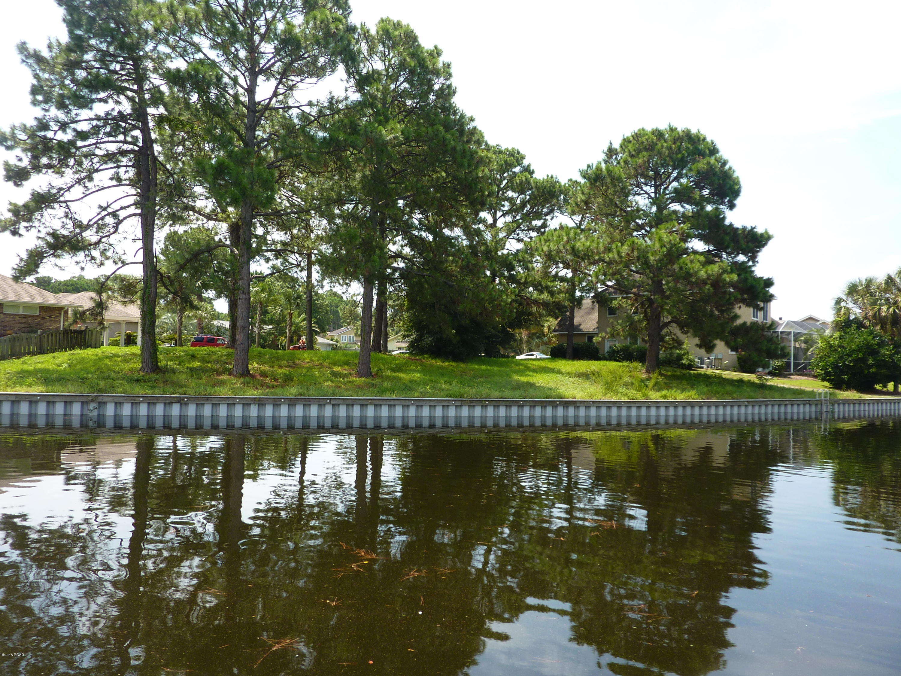 This cul-de-sac lot features 151 feet on the canal in Bay Point.  Great location and just ready for a new home to be built.

Bay Point is a gated community with 24 hour security.  With access to the Gulf, two golf courses, tennis courts, marina, and hotel, Bay Point community offers a resort life style.