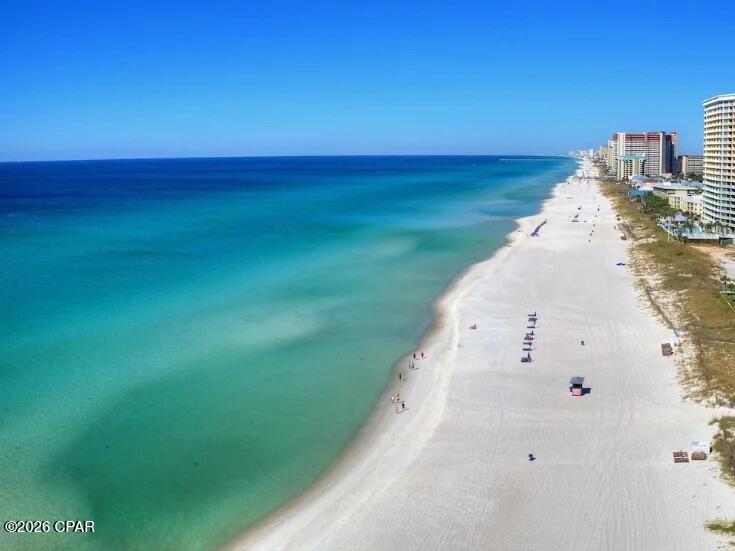 Gulf-front investment opportunity at Summit Beach Resort #1412 in Panama City Beach. This one-bedroom, one-and-a-half-bath condominium offers stunning, unobstructed views of the Gulf of Mexico from a private balcony and a highly functional layout that comfortably sleeps up to five guests.

The unit features a fully equipped kitchen, in-unit washer and dryer, and a spacious living area with a sleeper sofa to maximize occupancy. The primary bedroom includes an ensuite bath, with an additional half bath conveniently located in the hallway for guests.

Summit Beach Resort is a well-known, amenity-rich complex offering multiple pools, hot tubs, sauna, tennis courts, shuffleboard, on-site Tiki bar, grilling area, arcade/game room, playground, beach services, water sports, and a sundry shop.

This property presents strong income potential with minor cosmetic updates such as paint and furnishings. Updated units in the complex command higher rental rates, making this an excellent value-add opportunity for investors.

Located on the east end of Panama City Beach, just minutes from dining, shopping, golf, and entertainment. Close proximity to the new Tootsie's Orchid Lounge opening nearby is expected to further enhance rental demand and area growth.

Whether you're seeking a short-term rental investment or a personal beachfront getaway, this unit offers both immediate enjoyment and upside potential.