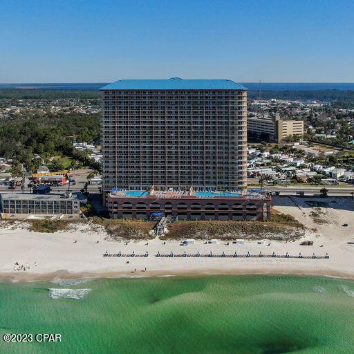 ' Currently under Contract Seller will Consider Back Up Offers *Furnished One bedroom PLUS Full BUNK ROOM!! Master and Main Living area face the Gulf with Panoramic views and separate Patio access. Two Full baths, Master w/ dual-vanity and separate tub/shower. Sunrise Beach offers an elevated gulf-front deck with two tropical pools (one heated), spas, children's water play area, gulf-front exercise room, meeting room and covered parking under the building. Deeded exterior owner's closet included ($15k Value)! Walk to Runaway Island, Sharky's and the Pier at Pier Park with shopping, ''Skywheel'', The Grande 16 Theater and D&B's!! Not to mention the beach dog park, AND concerts and festivals at Aaron Bessant and Frank Brown Parks!! Owners have pet privileges and short-term rentals allow