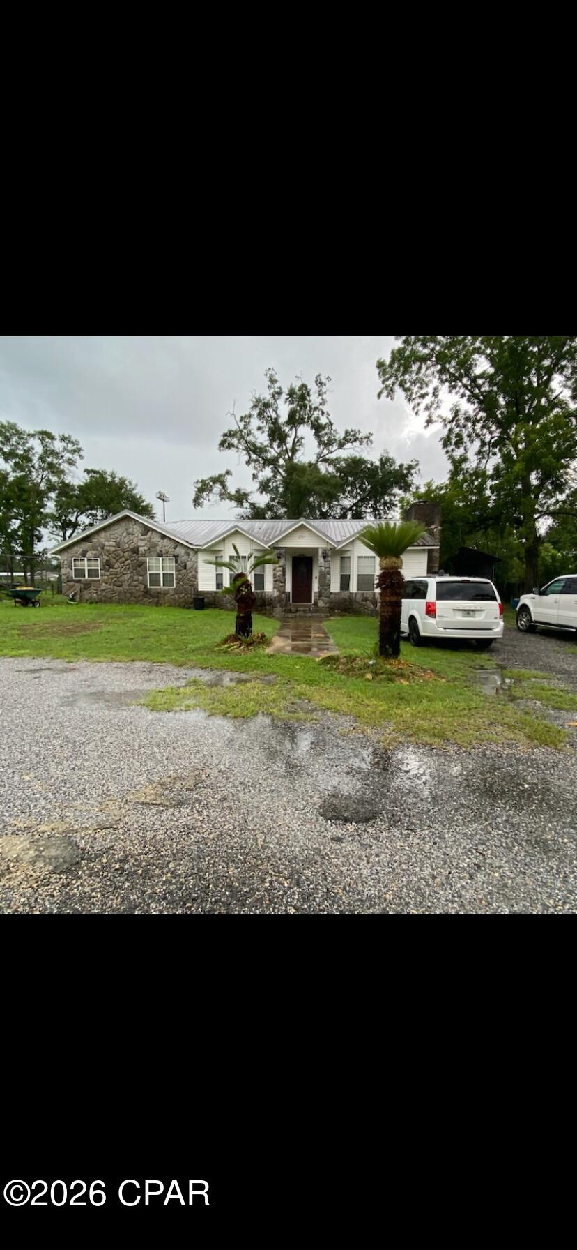 Very nice 3-bedroom, 2 bath home in the heart of Cottondale Fl.  Steps for the schools
Property consists of several lots in the city.  Home has a beautiful River rock fireplace.  A must see!!