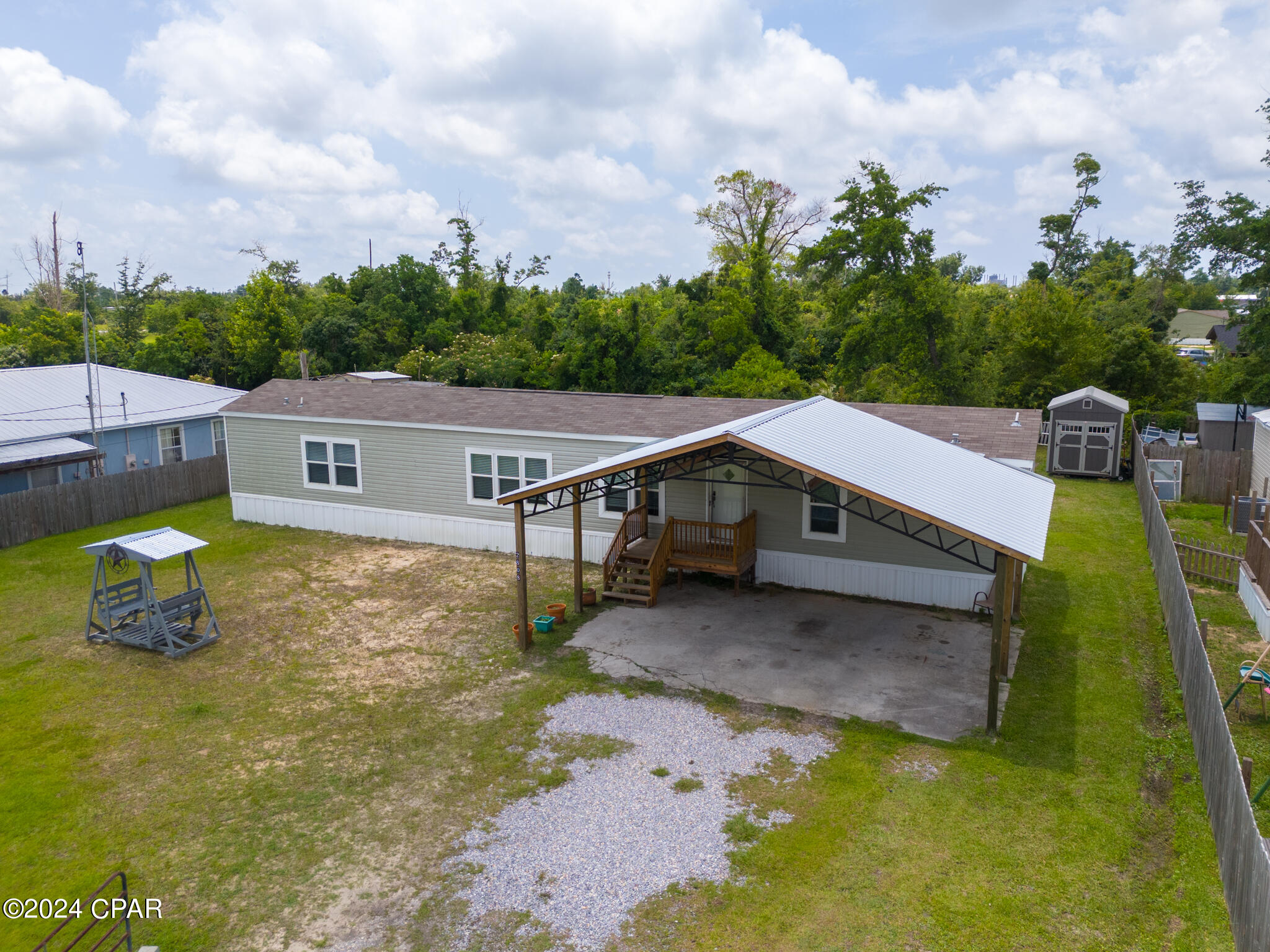 CURRENTLY UNDER CONTRACT, SELLER WILL CONSIDER BACKUP OFFERS Welcome to your new home! This 2020 3-bedroom, 2-bathroom mobile home offers a perfect blend of comfort and convenience, ideal for modern living. City sewer and water hooked up. 

This homes open layout provides a big feeling for the kitchen and living room maximizing all the space in these areas. With a split floor plan between the bedrooms makes it great for every family.

The Backyard is the perfect oasis with a newly attached  back porch for all family and summer fun ! Plenty of room in this fenced in backyard to entertain for any and all events. The newly added carport makes great coverage from weather and carrying in groceries to protect you from the elements! 

Have storage needs? This property comes with a 12x8 BARN STORAGE SHED that can be used in multiple facets! 

This mobile home offers a perfect blend of comfort, style, and functionality. Don't miss out on the opportunity to make this wonderful property your new home!

Schedule a showing now!