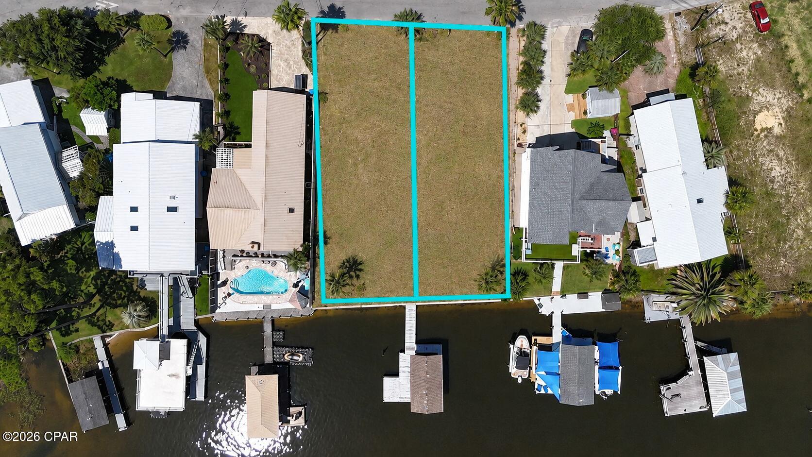 Rare opportunity to own a double waterfront lot on South Lagoon with approximately 100 feet of deep-water frontage and Gulf access. Opportunities like this are becoming increasingly difficult to find, especially with the flexibility and potential this property offers.

The true value is in the land. Situated on two lots, this property offers the potential to renovate, rebuild, or redevelop. Per the county, the existing residence may be removed and the lots split, creating a unique opportunity for investors, builders, or those looking to create a custom waterfront estate.

Enjoy direct waterfront access with an existing boat dock, boathouse with electric lift, and deep-water access suitable for a variety of boating needs. With its prime South Lagoon location, expansive waterfront frontage, and development potential, this is a property that offers both immediate enjoyment and long-term value.

Bring all offers. Opportunities to acquire a double waterfront lot with Gulf access in this location are rare.