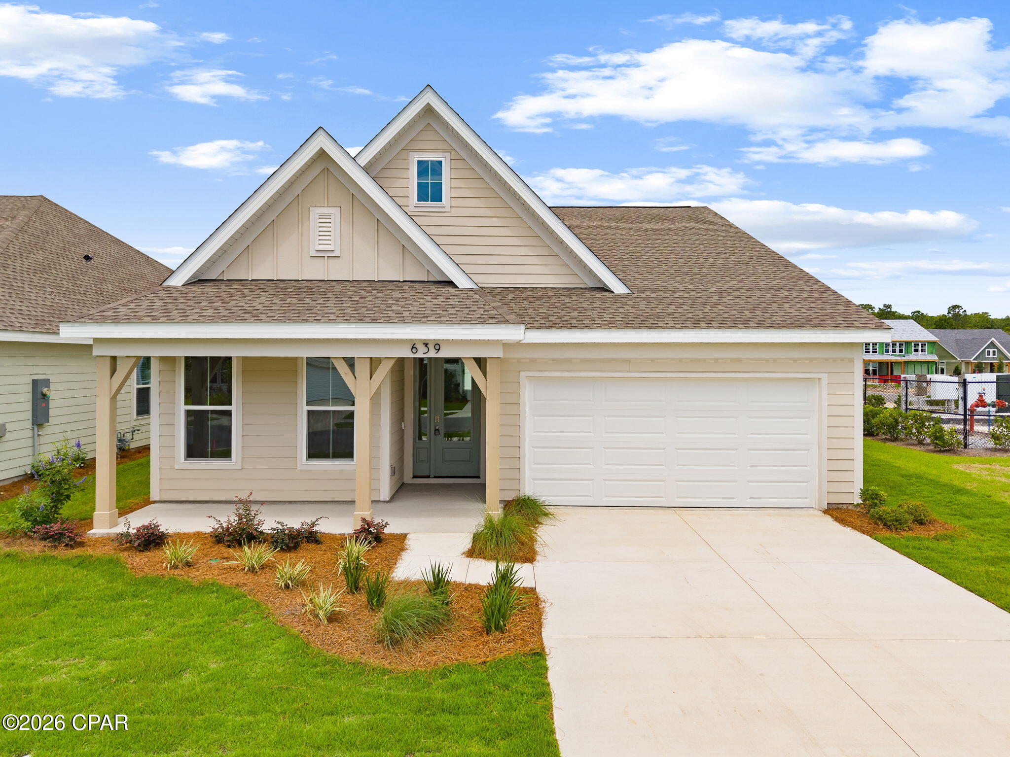 Why wait months to build when this stunning new construction home is ready for you today? Located in the desirable Salt Grass at Ward Creek community, this beautifully designed Camden floor plan by Fischer Homes offers modern finishes, thoughtful design, and a prime central Panama City Beach location just minutes from shopping, dining, entertainment, schools, and the world's most beautiful beaches. Step inside to discover tons of upgrades, no carpet, 9-foot ceilings and an open-concept layout designed for both everyday living and entertaining. The spacious island kitchen features stainless steel appliances, upgraded cabinetry with 42-inch upper cabinets and soft-close hinges, durable quartz countertops, and a large walk-in pantry. The adjoining morning room opens to a rear patio and flows seamlessly into the expansive family room. Privately situated at the rear of the home, the owner's suite offers a peaceful retreat complete with dual vanities, a walk-in shower, and a generous walk-in closet with direct access to the laundry room for added convenience. Two additional bedrooms and a centrally located full bath provide plenty of space for family or guests. Additional features include an attached two-car garage, covered front porch, energy-efficient new construction, and the peace of mind that comes with a brand-new home. Don't miss this opportunity to enjoy all the benefits of new construction without the wait.
