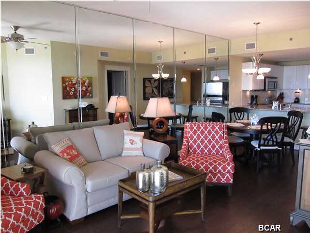 Come experience life at the beach in the fabulous Grand Panama Beach Resort! Beautiful condominium resort complex in Panama City Beach with amenities galore. Enjoy your gorgeous condo with 2 bedrooms, 2 bath, AND bunk area. This unit has never been rented and is only gently used by family members. Upgraded furniture and decor, stainless appliances, granite countertops, and new flooring throughout. If you are looking for investment reasons - this would be a great rental - this is a desirable 2nd floor unit in the more quiet Tower II, close to parking, elevators, exercise room and the rooftop heated pool. Put in a pull out sofa sleeper and you can sleep 8! Gulf views from master bedroom, living room, and spacious balcony. Excellent location close to shopping, dining, and all Panama