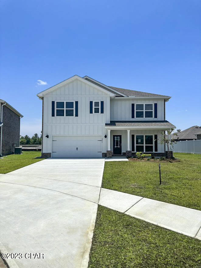 The Carol floor plan is an exceptional 5-bedroom, 3-bathroom home with plenty of space and extra storage. This one is the L Elevation, meaning the spacious 2-car garage is on the left side of the front door. As you enter this home, you will find a Flex room to the right, which can be used as a dining room, home office, study, media, playroom or a mancave! Continuing down the entry way of the home, the kitchen will be directly to the right at the end of the entry way. The family room/main living room is open and spacious connected with the breakfast nook area, which is big enough to be used as a formal dining area as well, leading to the covered back porch. You also have a spacious walk-in Closet under the Staircase, right next to the entry to the 2-car Garage.
Upstairs you'll find a spacious bonus room, which can be used as a playroom or a media room, with bedroom 4 and 5 connected to it. The Bonus room also has a Closet for extra storage.
Bathroom 3 down the hall to the right, also leads to bedroom 3. Upstairs you also have bedroom 1, or the spacious Main Bedroom, with the Main Bathroom that has a double vanity, walk-in closet, a separate Garden tub and a separate Shower with a Glass door. There is also a Window in the Main Bathroom, giving you plenty of natural light!
Since most bedrooms are located upstairs, the Laundry room is conveniently located upstairs as well.
All countertops in the kitchen and bathrooms are granite, flooring in all the main and wet areas is the Luxury Vinyl Plank and there is carpet in all bedrooms and upstairs.

AREA:
Hodges Bayou community is located off of HWY 77A (also called HWY 2321), which is conveniently located between 2 major Highways 231 that can lead you to Panama City, Bayou George, Callaway, Youngstown, Fountain, Cottondale and Marianna, and HWY 77, which can lead you to Lynn Haven, Panama City, Panama City Beach, and also Vicksburg, Sunny Hills, Econfina Creek, and Chipley.
Main grocery stores are just 11 minutes' drive (4.3 miles), however there are also plenty of convenient stores within 4 minutes' drive as well. Northwest Florida Beaches International Airport is just around 19 minutes' drive (15 miles), 20 minutes (12 miles) to Downtown Panama City, 18 minutes' drive (10 miles) to Gulf Coast Medical Center, 25 minutes' drive (11 Miles) to Sacred Heart, 30 minutes' drive (12 miles) to Tyndall Air Force Base,
Panama City Beach is just around 35 minutes' drive, Econfina Creek is just around 30 minutes' drive, however there is a public Boat Ramp with a little local Beach rest area with picnic tables and a playground right off of HWY 77A, which is just 1 minute drive! The community itself has its own Playground area for your kids, which is conveniently located further away from the main Highway.
Lynn Haven Bayou Park and Preserve is located just around 3 miles away, that has gorgeous nature trails, playground areas and a nice beach as well!