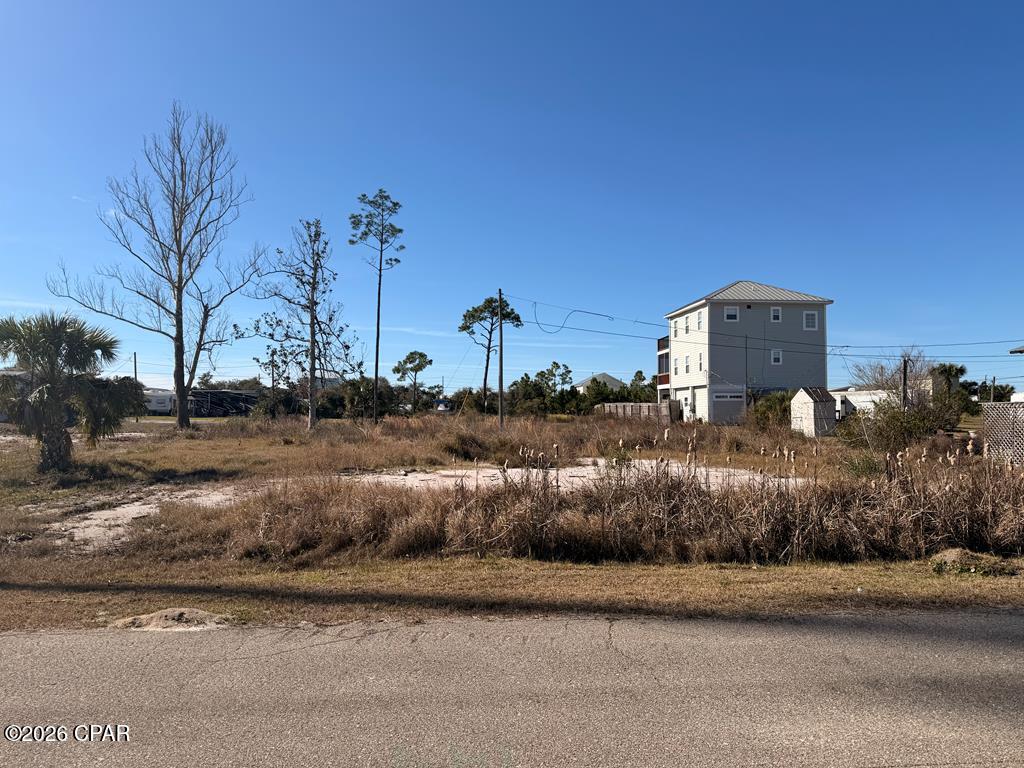 Rare double-lot opportunity just steps from the sand makes this property an excellent fit for both personal use and investment-focused buyers. Public Beach access is just down the road. This rare offering combines two adjacent lots--approximately 100x100 feet total--X FLOOD ZONE! NO FLOOD INSURANCE REQUIREMENT--on Olive Avenue in the coveted Beacon Hill area, giving you a larger, more versatile footprint than most standard homesites. Located just a short walk from the white-sand shoreline and stunning Gulf sunsets, this spacious parcel is ideal for a custom beach home, vacation retreat, or future rental property. Public beach access is conveniently just down the road, with golf cart-friendly back streets providing easy routes to the shoreline, local dining, and laid-back coastal amenities. The generous double-lot configuration provides room for expanded outdoor living, parking, and potential additions such as a pool or extra storage, all without the constraints of an HOA. Beacon Hill and St. Joe Beach are known for their pet-friendly beaches, small-town atmosphere, and relaxed coastal lifestyle--combined parcels of this size and location are a rare find, offering a prime chance to secure a bigger slice of Florida's Forgotten Coast.  Seller is open to offering seller financing, with terms, conditions, and approval at the sole discretion of the seller.