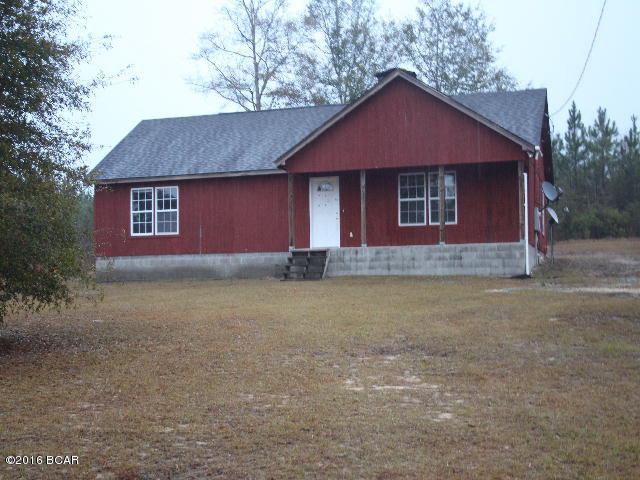PRICE REDUCED!! This 2 bedroom 2 bath sits on on a hill on 5 acres!There are two wet weather ponds in front of the house and there is a small wooded bridge that goes across it to get up to the house. The house is roomy with a large living room and a large kitchen/dining combo. It is only a short drive into Bonifay where you have access to all local amenities. A yard building is included. Note: The property appraiser tax records has the number of bedrooms incorrect and the roof material incorrect.