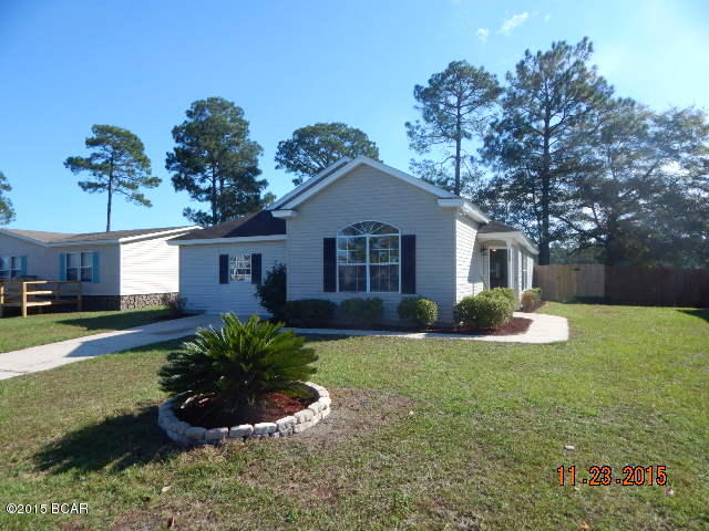 COMPLETELY UPDATED!  This 4 bedroom, 2 bath home has just been beautifully updated with new paint, flooring, appliances and countertops. There is a built-in desk in the 4th bedroom, which could also be a playroom or office. The large back yard is privacy-fenced and the neighborhood has a private lake with beach and pavilion for everyone to enjoy.  The association fees are only $200/year.  All measurements approximate, please verify if important.