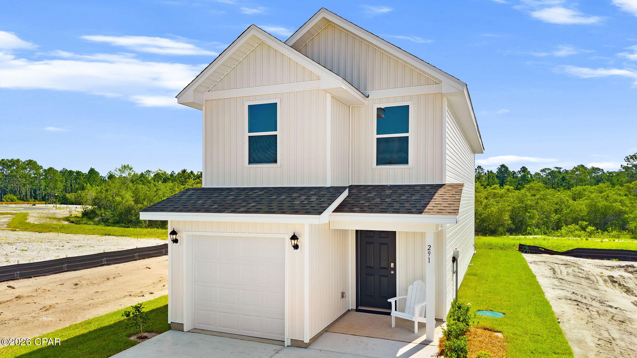 Welcome to 291 Coastal Canopy Lane, a new home featured at Salt Pines in Port Saint Joe, Florida. The Bandon, a charming two-story home featuring 3 bedrooms, 2.5 bathrooms and offering 1,454 sq ft of living space with a 1-car garage. This cozy home is perfect for the comfy vibes that Port Saint Joe is known for.
A front porch welcomes you into this home which then opens to a seamlessly flowing living room, dining room and the open concept kitchen which includes granite counters, quality cabinets, stainless steel appliances. The bottom level also features a half-bathroom and pantry next to the kitchen and stairs. Upstairs, the primary bedroom has an attractive ensuite bathroom that features a granite vanity countertop and quality cabinetry. Enjoy additional storage with a spacious walk-in closet located off the primary bathroom. Your secondary bedrooms all feature quality carpet flooring and a closet, and can be used as bedrooms, offices, work out spaces or other bonus rooms. The possibilities are endless with the Bandon floor plan.

Additional features include EVP flooring in entry, living room, and all wet areas with soft carpet in the bedrooms. There are granite counter tops in all bathrooms and kitchen as well as a Smart Home Technology package allowing one central hub that talks to all the devices in your home. You can control the lights, thermostat and locks, all from your cellular device.

On the Exterior you will see quality vinyl siding, a covered front porch, and a patio in the back yard to enjoy the beautiful Florida weather. After a day of enjoying all that Port Saint Joe has to offer, enjoy a quiet neighborhood with friends and family in this cozy home.

To learn more about the Bandon plan and about Salt Pines, get connected with us today by requesting more information. We look forward to telling you more about these lovely homes!