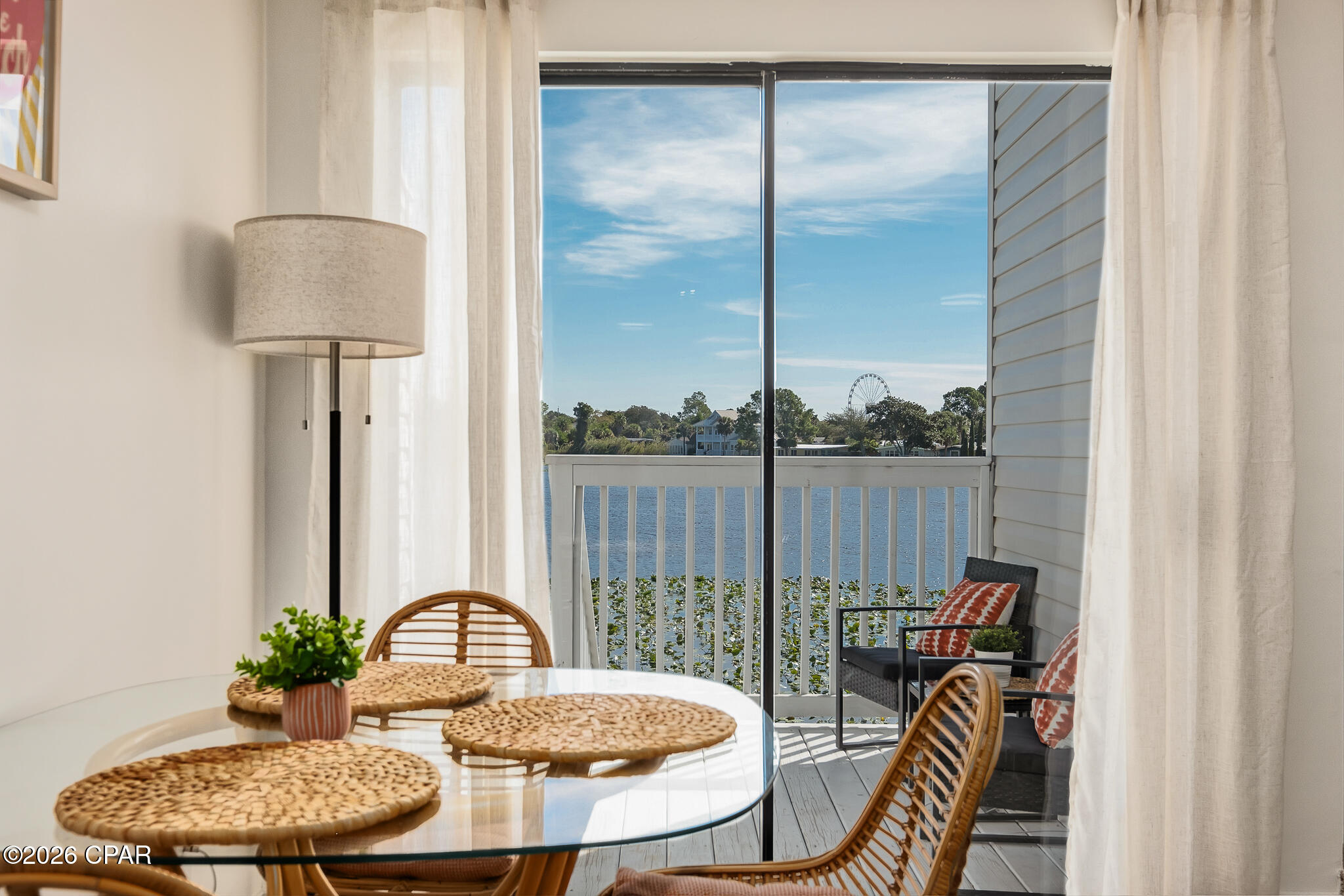 Welcome to Lullwater Beach Unit 411, ideally situated just steps away from the beach! HVAC system (2022), washer and dryer (2023), and water heater (2022). This recently updated, freshly painted, and fully furnished 2-bedroom, 2-bath condo offers the perfect combination of coastal charm and strong investment potential. The property already has numerous secured future bookings for 2026, with projected gross rental income estimated to reach approximately $40K by the end of the year.

Tastefully furnished and rental-ready, this condo comfortably sleeps up to 6 guests and features an updated kitchen with newer appliances, luxury vinyl plank flooring throughout the living room, kitchen, and bedrooms, along with tile flooring in both bathrooms. Both bathrooms have been upgraded with beautifully tiled showers.

Enjoy relaxing by the community pool or taking in tranquil lake views from your private back porch overlooking Lullwater Lake. Located less than half a mile from Pier Park, about one mile from Frank Brown Park, and only minutes from dining, shopping, and entertainment, this property is an excellent option for a vacation home, primary residence, or income-producing rental. The Lullwater community has recently undergone extensive exterior upgrades, including new siding, roofs, decks, and staircases. Owners also benefit from ample parking and a pet-friendly environment. This turnkey beach retreat is a fantastic opportunity in one of Panama City Beach's most convenient and desirable locations.