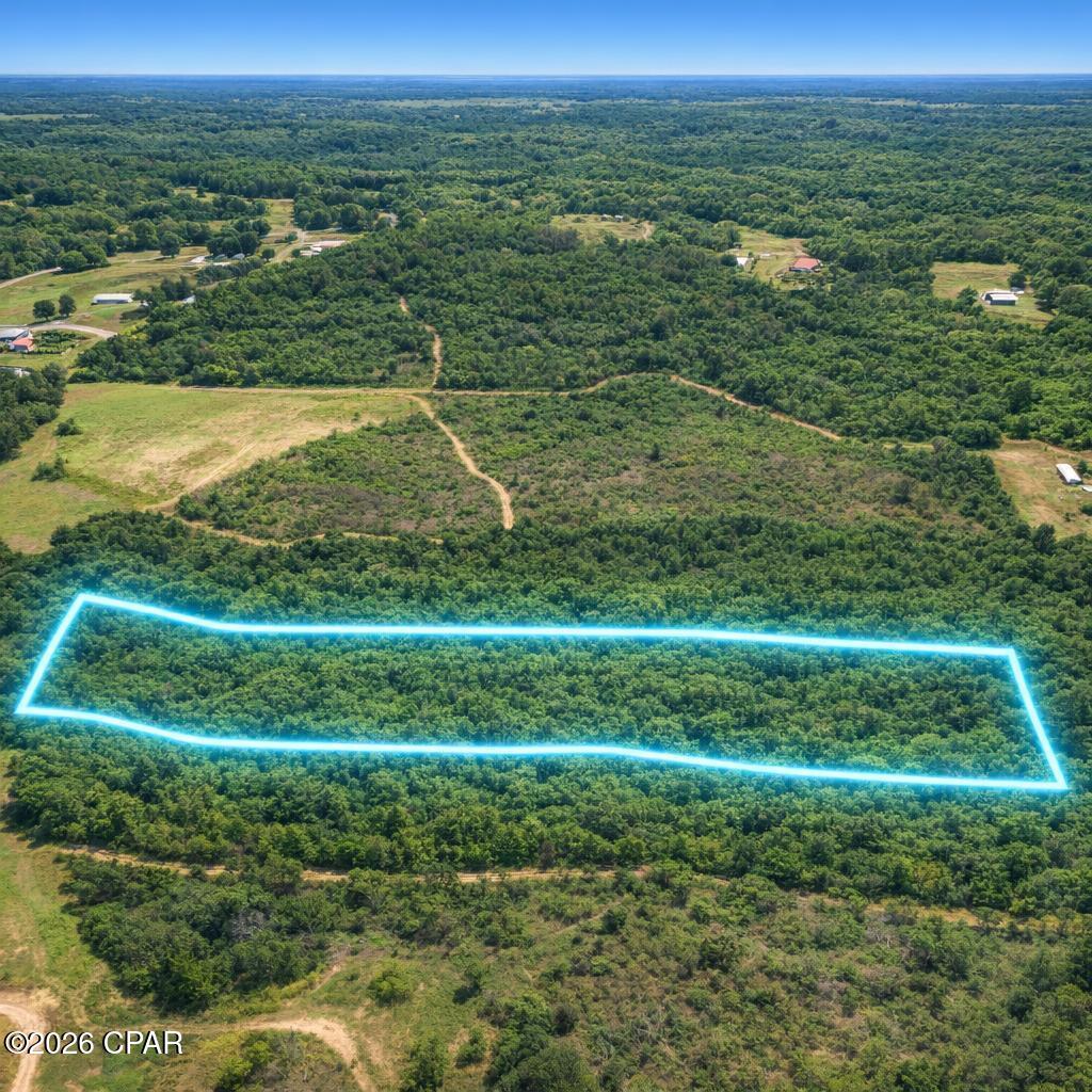 Discover the perfect blend of privacy and convenience with this beautiful 7.26-acre tract located just outside Marianna. Completely naturally wooded, this property offers a peaceful setting with mature timber and abundant wildlife, making it ideal for a homesite, weekend retreat, or recreational getaway.

Access is provided by a recorded easement from paved Old U.S. Road, offering easy year-round entry while maintaining the seclusion and tranquility of a larger rural parcel. Enjoy the benefits of country living with the convenience of being only minutes from shopping, dining, schools, and other amenities in Marianna.

Whether you're looking to build your dream home, invest in land, or simply own a private piece of North Florida's natural beauty, this 7.26-acre property presents an outstanding opportunity.
Based on County Flood Map all property is high and dry; no flood zone.
