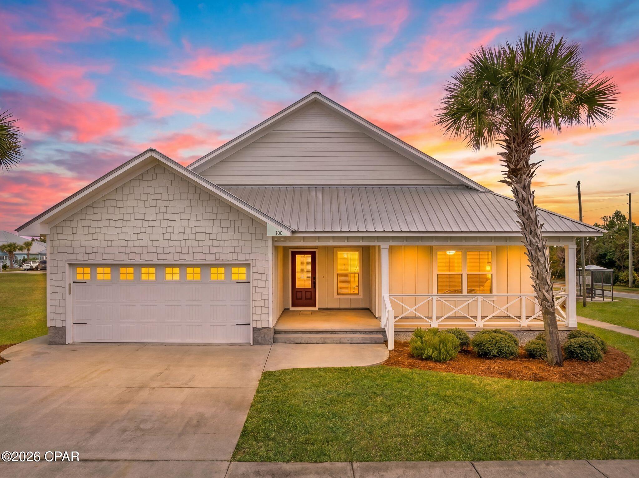 Welcome to Casuna, one of Mexico Beach's most sought-after residential communities. This beautifully maintained 4-bedroom, 2-bath home offers the perfect combination of coastal charm, quality construction, and neighborhood tranquility, with short-term rentals prohibited to help preserve the community's residential character. Designed for comfortable living and effortless entertaining, the home features an inviting open-concept layout filled with natural light. The spacious kitchen is equipped with granite countertops, stainless steel appliances, abundant cabinetry, and a generous dining area that flows seamlessly into the main living space. The primary suite provides a relaxing retreat with a beautifully appointed en-suite bath featuring dual vanities, a large walk-in tiled shower with glass enclosure, and ample storage. Three additional bedrooms offer flexibility for family, guests, a home office, or hobby space. Outside, enjoy the welcoming front porch, covered rear porch, and attractive paver patio--perfect for relaxing after a day at the beach or gathering with friends and family. A metal roof, two-car garage, mature landscaping, and exceptional curb appeal further enhance this property's appeal. Conveniently located just minutes from Mexico Beach's sugar-white sand beaches, local dining, shopping, and boating opportunities, this home offers the ideal blend of coastal convenience and everyday comfort. If you've been searching for a move-in-ready home in a well-maintained community along the Forgotten Coast, this Casuna property deserves a place at the top of your list. Some photos are virtually staged.
