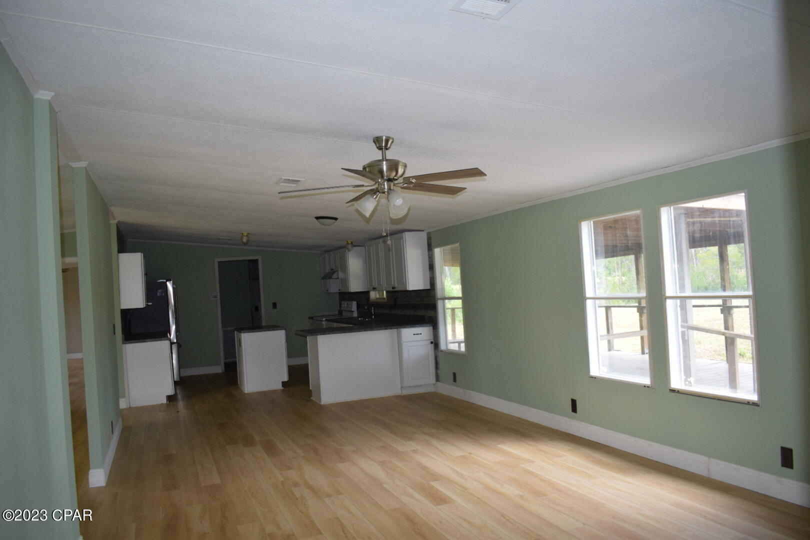 4 BD mobile home in a fast developing area of Fountain. It sits on  2 acres,  fenced and cleared with a pond and shed with a roof on the back for your work. Seller has done nice work in remodeling and updating  the property. All new paint, countertops, cabinets, floors. New HVAC & heat pump. All new doors, walk-in closet, new back porch. You  don't want to miss it !! And NEW ROOF !!
