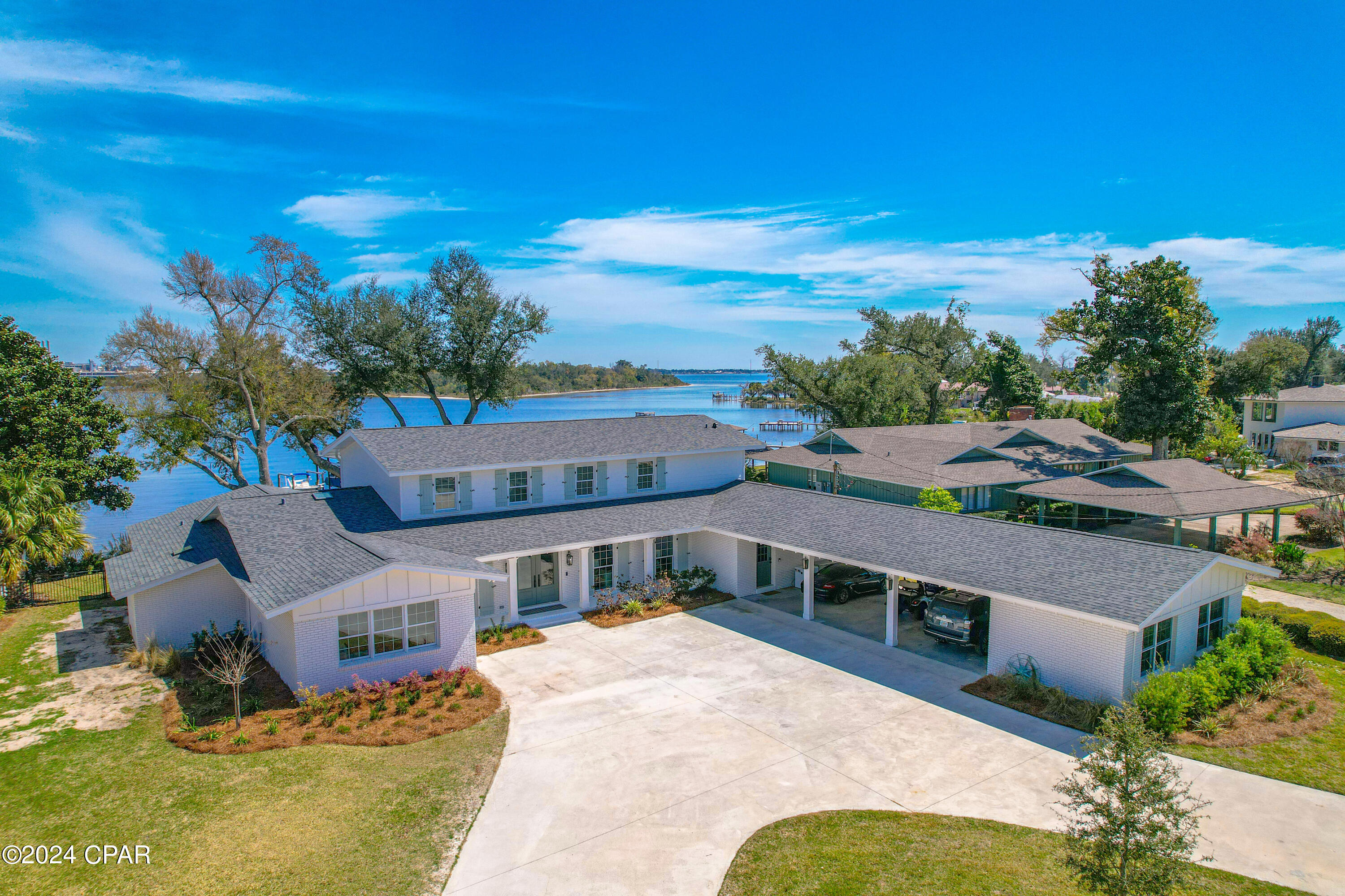 Entered for comp purposes only. This is a beautiful, fully-renovated waterfront home in the historic Cove neighborhood. Offering over 5,200 square feet, 5 bedrooms, 4 full baths and 2 half baths, this two story home features a main level primary suite and multiple living areas with pure bay views. This home also features a pool and dock.
