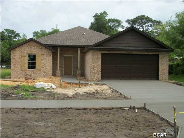 New home with 4 bedrooms and two baths. Great location being one block from Lynn Haven city hall, tennis, grocery store, and farmer's market. Wood laminate floors in the living area, modern cabinets with granite counter tops. This will be a beautiful home.