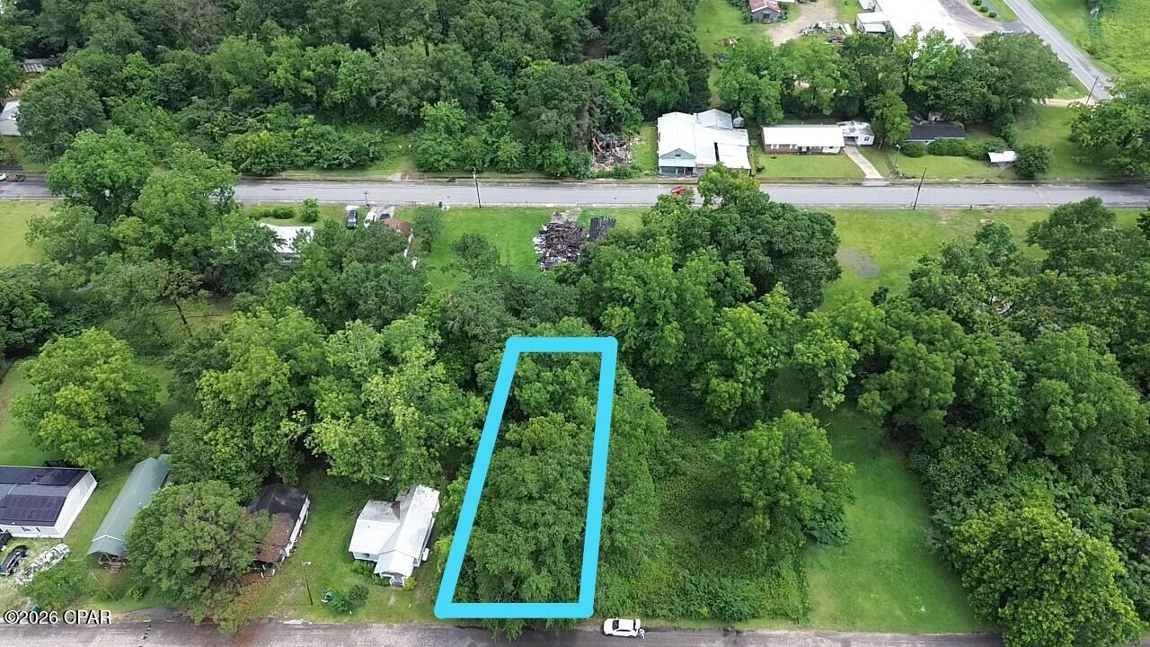 Discover the perfect blend of small-town charm and natural serenity with this charming vacant lot in Graceville, Florida. Spanning 0.15 acres, this private parcel offers a peaceful setting ideal for building your dream home, a weekend getaway cabin, or as a smart land investment in a growing area.

Tucked away yet conveniently located, the lot provides a blank canvas surrounded by privacy while still being part of an established community. Whether you're envisioning a cozy single-family residence or a modern build, this property delivers the space and potential to make it happen.

Graceville is a welcoming small town with everything you need right at your fingertips grocery stores, restaurants, pharmacy, hardware stores, and shopping all within easy reach. It is also home to Baptist University of Florida, bringing a vibrant energy to the community. Just 30 minutes from Dothan, AL for larger-city conveniences, and a little over an hour from the beautiful white-sand beaches of Panama City Beach.

This is country living at its best quiet, friendly, and full of opportunity. Whether you're a first-time builder, retiree seeking a peaceful setting, or an investor looking for affordable land in the Florida Panhandle, this lot is a rare find.

Don't miss your chance to own a piece of Graceville's appeal. Schedule a viewing today and start planning your future in this wonderful community.