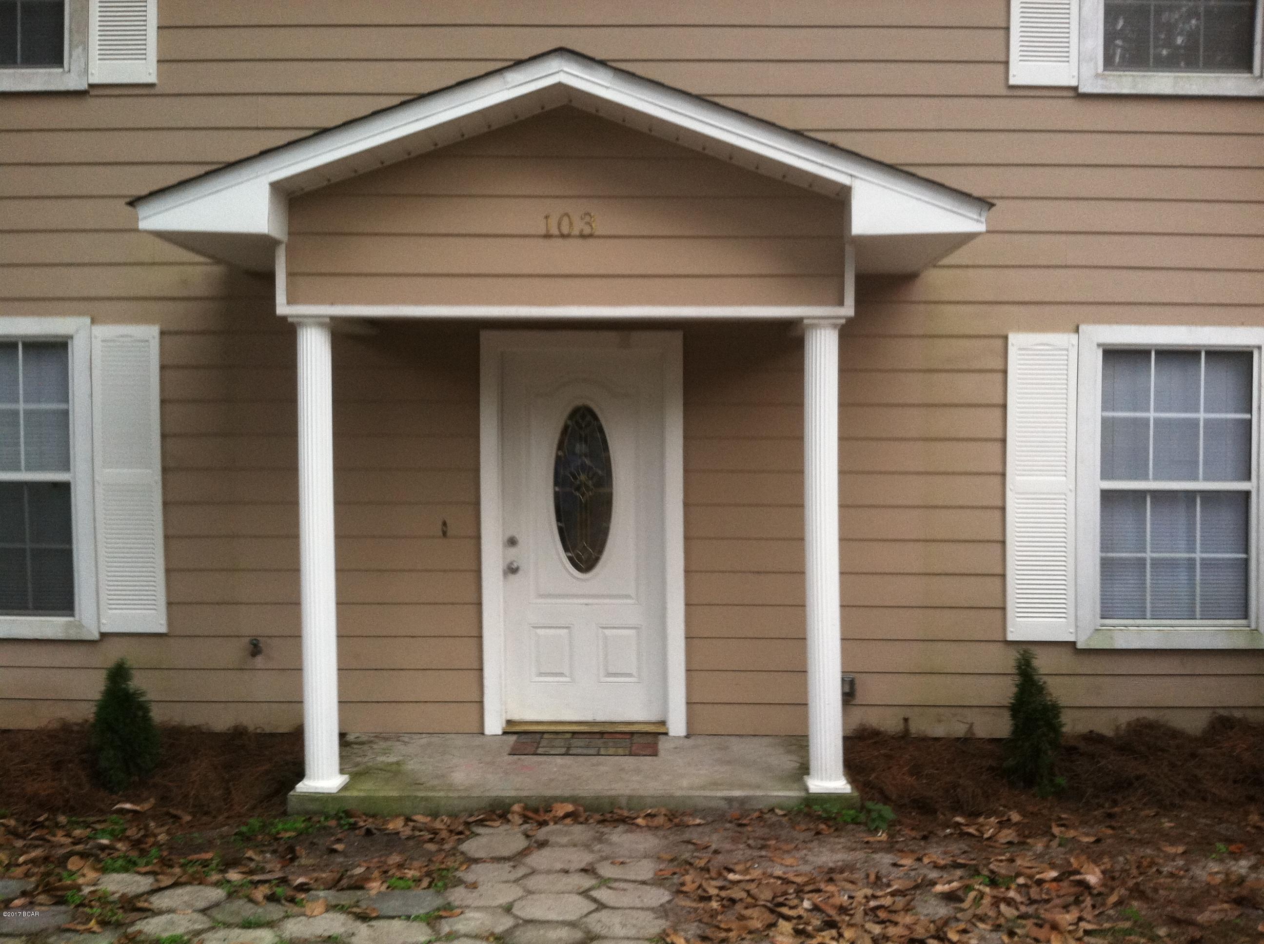 This charming 3 bedroom, 1 & 1/2 bath, 2 story home is centrally located in Lynn Haven. Features a split floor plan, kitchen with lots of storage for all your kitchen items as well as a large pantry, broom closet, and a large storage closet under the back of the staircase. Washer/Dryer hook ups. Large master bedroom with walk in closet. Both of the guest bedrooms also have spacious closets. This lot is surrounded by chain link fencing, which is equipped with two yard buildings, one is in the front and a larger one in the back yard. Pets are negotiable with non-refundable $150 per animal fee.