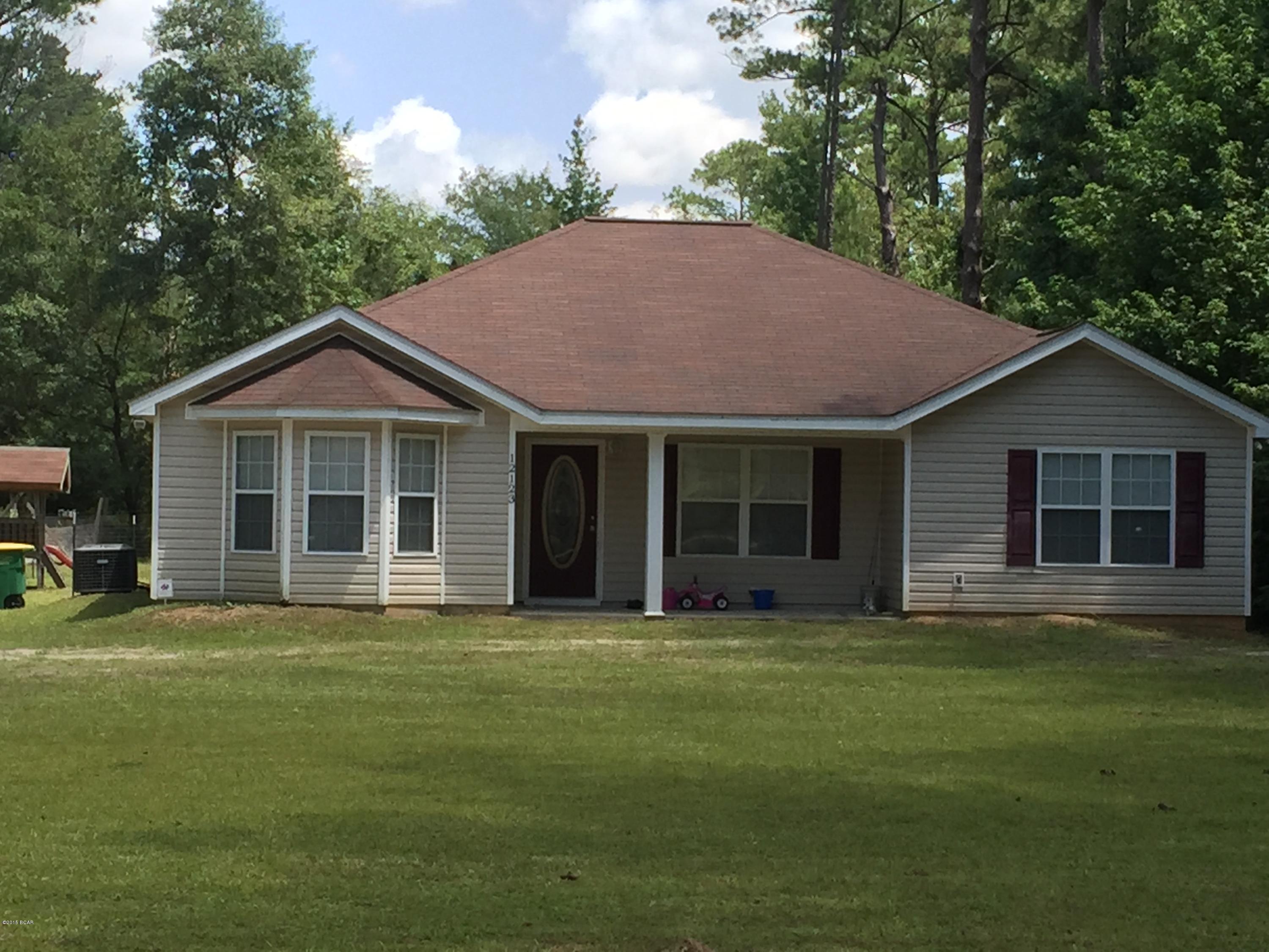 Life in the country and just a short drive to Panama City or north to I-10. This is the perfect house for those folks looking for country life while not being isolated.  Fountain is just a short drive north from Panama City and south from I-10.  This house sits back from the road, has a covered porch, fenced back yard and has been well maintained. Built in 2006 and featuring vinyl siding for low maintenance, this is a great place to raise children or retire.  See it before it's gone.