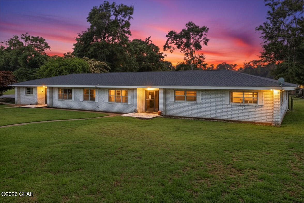Will consider seller financing.
Experience the perfect blend of luxury, privacy, and country living with this exceptional estate property located in beautiful Chipley. Situated on 30.08 acres +/- of picturesque land, this impressive property offers more than 3,000 square feet of living space designed for comfort, versatility, and entertaining -- all while being conveniently located near everyday amenities, shopping, dining, and recreation.
Tucked away with total privacy, this one-of-a-kind property provides the peaceful lifestyle you've been searching for while still offering easy access to the best of Northwest Florida. Enjoy a short drive to Northwest Florida Beaches International Airport, making travel simple and convenient, while also benefiting from easy access to the stunning beaches, dining, and entertainment of Florida's renowned Emerald Coast.
Inside the home, you'll find an expansive floor plan featuring both a formal living room and a spacious family room, creating the ideal setup for entertaining guests, hosting holidays, or simply enjoying comfortable everyday living. A dedicated office with its own private entrance provides an outstanding opportunity for a home-based business, client meetings, remote work, or a private studio space. The additional game room offers endless flexibility and could easily serve as a media room, recreation space, homeschool area, or guest retreat.
Step outside and discover your own private resort-style setting featuring a newly installed in-ground saltwater pool supplied by fresh well water -- offering lower maintenance, softer water, and an ideal place to cool off during warm Florida summers. The large, fully stocked pond creates a peaceful backdrop perfect for fishing enthusiasts, where ''guaranteed catches'' and unforgettable sunsets become part of everyday life.
For those needing space for hobbies, equipment, livestock, or recreational living, this property truly delivers. The large pole barn with additional storage and tackle room provides excellent functionality for farming equipment, recreational vehicles, boats, workshop space, or outdoor gear. A power supply is already installed at both the well pump and pond, creating an ideal setup for RV hookup capabilities, additional utility access, agricultural operations, or future expansion opportunities. With over 20 acres already fenced and ready for livestock, this property is perfectly suited for horses, cattle, hobby farming, or anyone looking to embrace the freedom and possibilities of rural living while remaining centrally located to modern conveniences.
Adding even greater long-term appeal, the property also offers access to the nearby Nearing Hills Development area, providing the benefit of proximity to a growing residential community while still maintaining the privacy and acreage of a true estate property. This nearby development enhances future value potential, supports continued area growth, and offers convenient access to expanding infrastructure and neighboring residential demand -- all while preserving the peaceful atmosphere that makes this property so unique.
Whether you're looking for a family compound, equestrian property, recreational retreat, income-producing opportunity, or a place to successfully operate your business from home, this property offers exceptional versatility and long-term value.
Opportunities like this are rare. Schedule your private showing today and experience everything this extraordinary Northwest Florida estate has to offer.

Property is located on private drive. Showings are by appointment only.

Some photos contain virtual stagin
