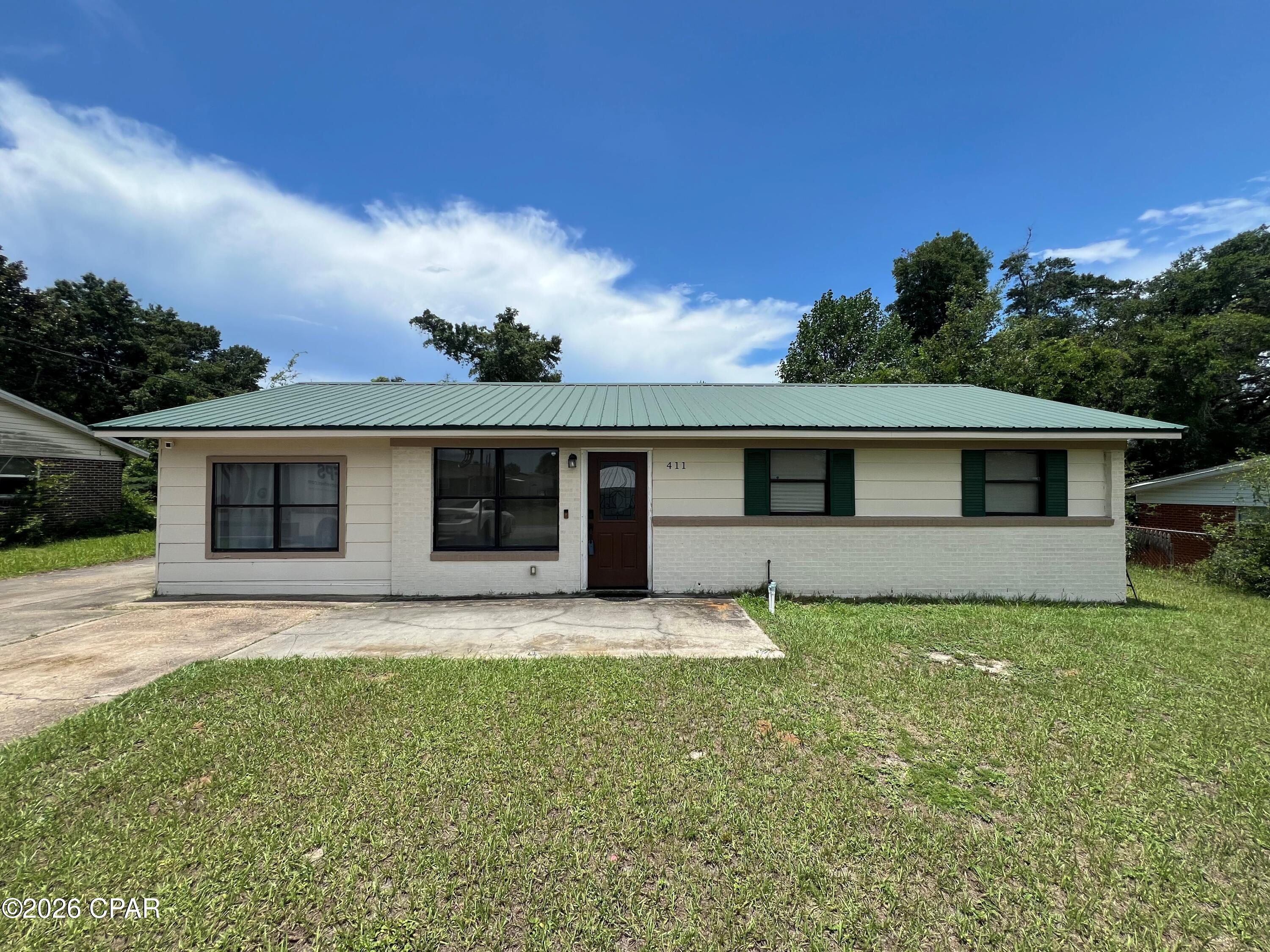 Charming Cottage.    Up-to-date with open floorplan, fresh LVP flooring,  Fresh kitchen cabinets,  granite countertops and custom showers in both bathrooms.  New metal roof in 2019. 
Great location , close to Tyndall A.F.B , schools and shopping.
Originally built in 1965 with an Effective Year built of 2015