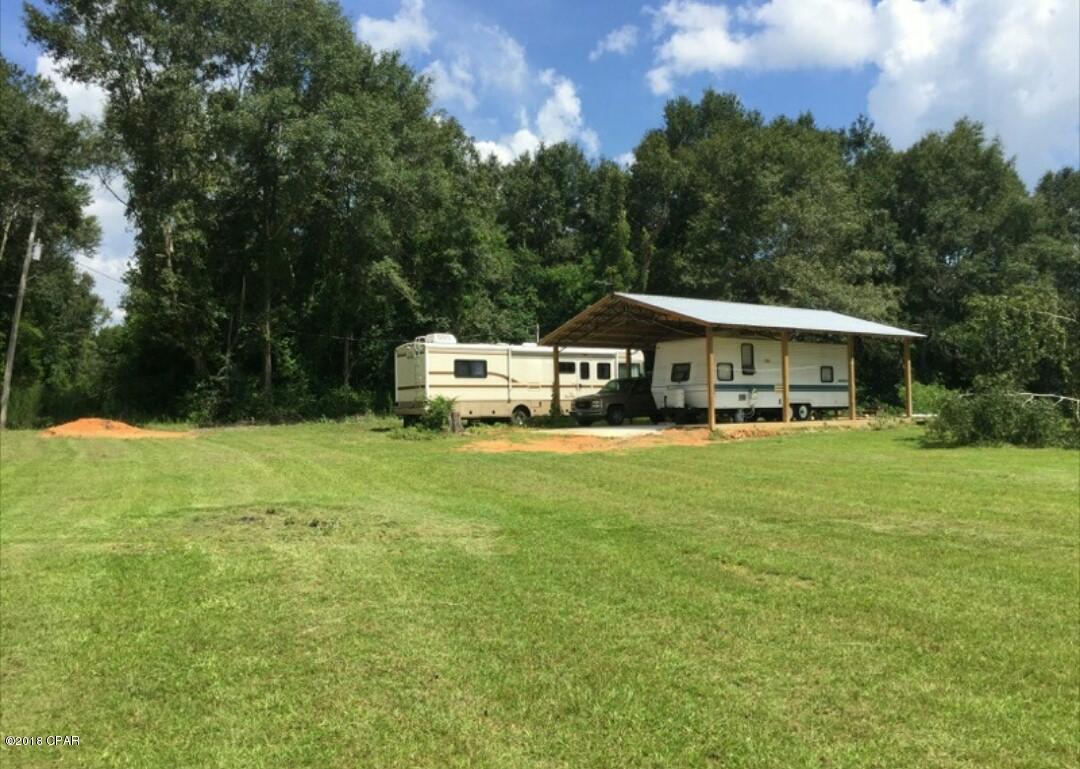 This property features a beautiful pecan orchard and would be a beautiful place for your dream home!  Propery also has 24x36 pole barn with concrete, electric, city water, and a septic tank.