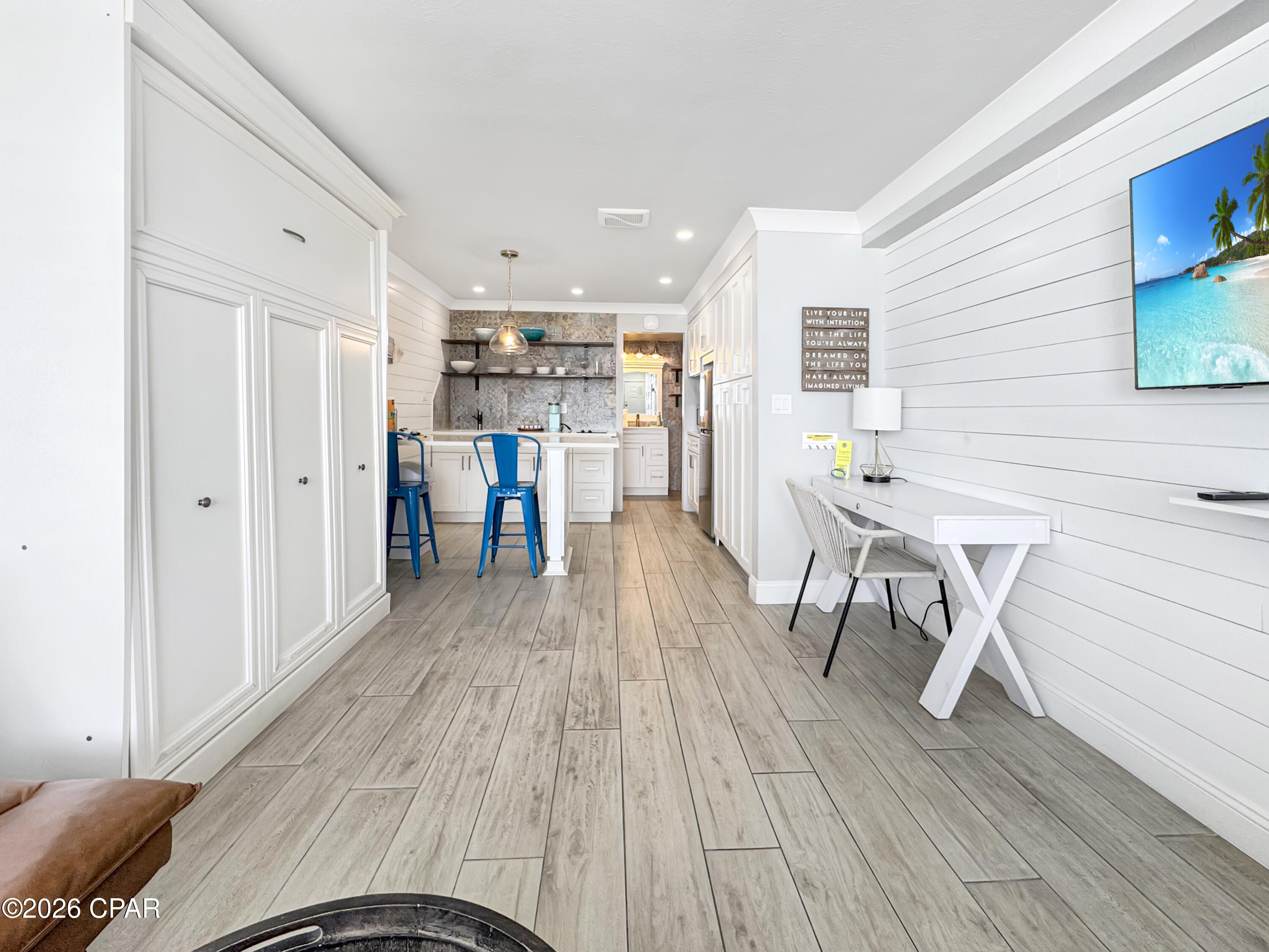 Investor alert! This is hands-down one of the best opportunities in Fontainebleau with proven rental performance and stunning Gulf-front views. This beautifully renovated beachfront studio generated an impressive $27,303 in 2024 and has already produced $22,376 in 2025, making it an exceptional turnkey investment on the Gulf Coast.

Located directly on the sugar-white sands of Panama City Beach, this iconic 2nd floor condo offers unobstructed east facing views of the Gulf and true beachfront living just steps from the water. Thoughtfully updated with coastal-inspired finishes, the unit features shiplap walls, quartz countertops, a full kitchen with full-size refrigerator, cooktop, and microwave, plus a Murphy bed that maximizes both functionality and space.

Fontainebleau offers outstanding resort-style amenities including a large Gulf-front pool, expansive sun decks, fitness center, beach volleyball courts, wireless internet, elevator access, and on-site management. One assigned parking space is included.

The HOA dues provide exceptional value by covering all utilities(even electricity), internet, building insurance including flood and hurricane coverage, exterior maintenance, amenities, and management services for truly low-maintenance ownership.

Ideally situated on a less crowded stretch of beach overlooking Bid-A-Wee beach access with no future development blocking the views, yet conveniently located near Pier Park, Top Golf, shopping, dining, and entertainment. Whether you're looking for a vacation getaway or a high-performing short-term rental investment, this fully updated Gulf-front studio is an opportunity you do not want to miss.