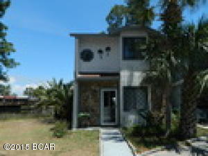 Waterfront with boat slip in gated community of Harbour Towne! Conveniently located just over the Hathaway Bridge on the beach side. This 2 bedroom, 2.5 bath town home includes a deep-water boat slip and large deck for entertaining. Available furnished or unfurnished. The living room is open to the dining and kitchen with breakfast bar. Pergo wood flooring in the downstairs living areas and half bath. New appliances including washer/dryer. Upstairs is the master bedroom with balcony overlooking the lagoon front and attached bathroom. Additional bedroom and bathroom also upstairs. **No pets allowed. Rent Includes Basic Cable and Garbage!